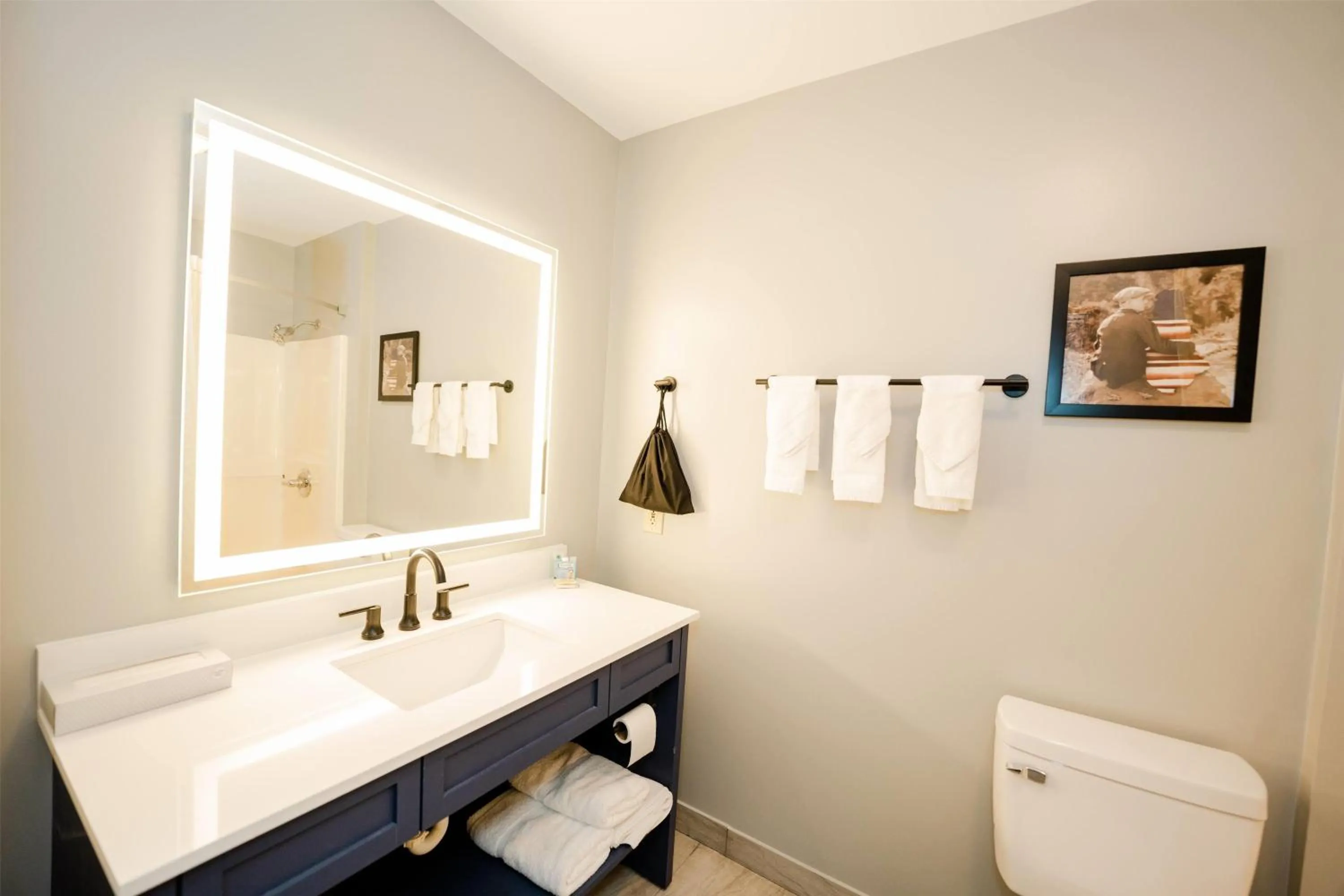 Bathroom in AmericInn by Wyndham Tomahawk