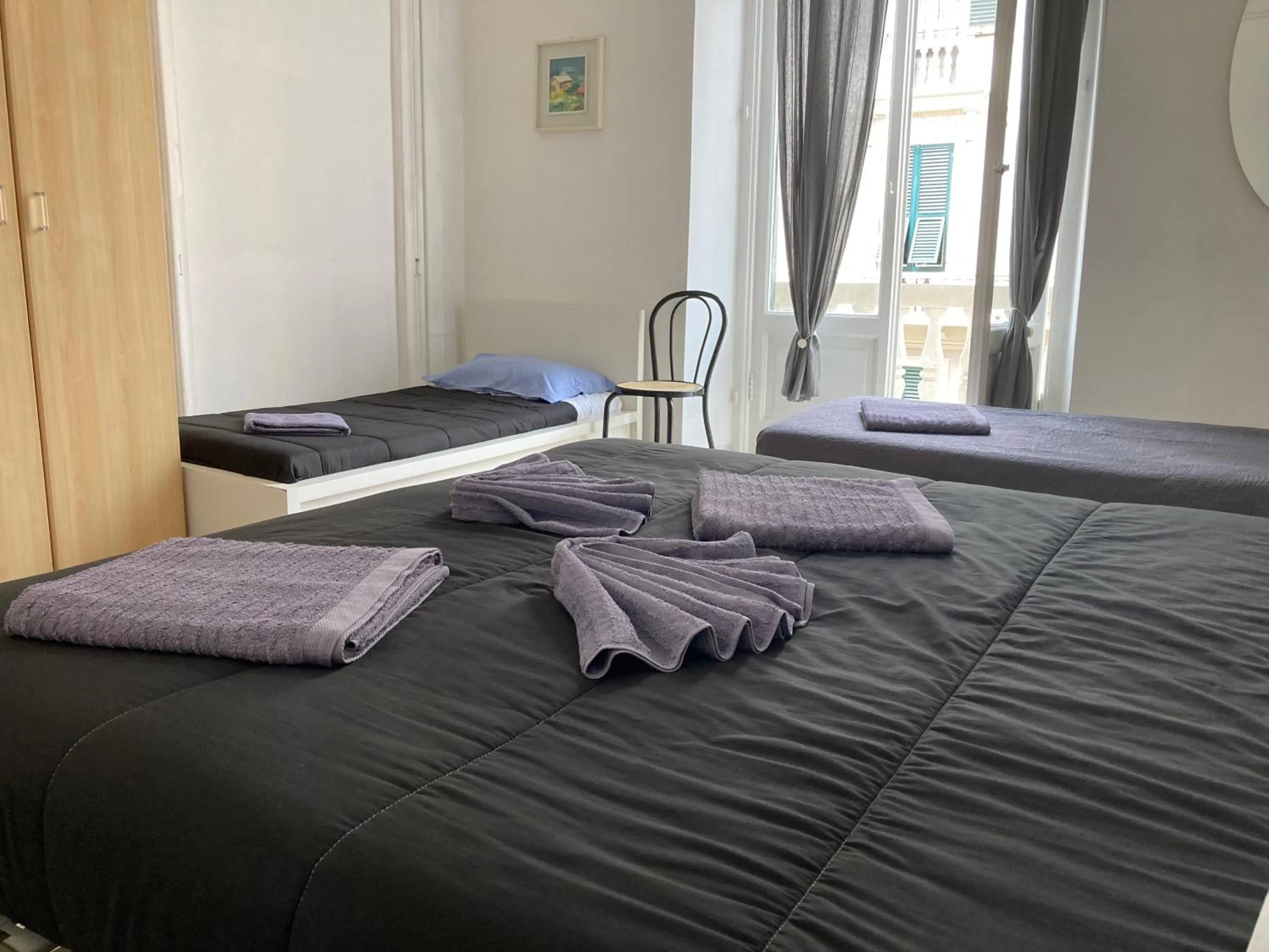 Bed in Guest House Roma