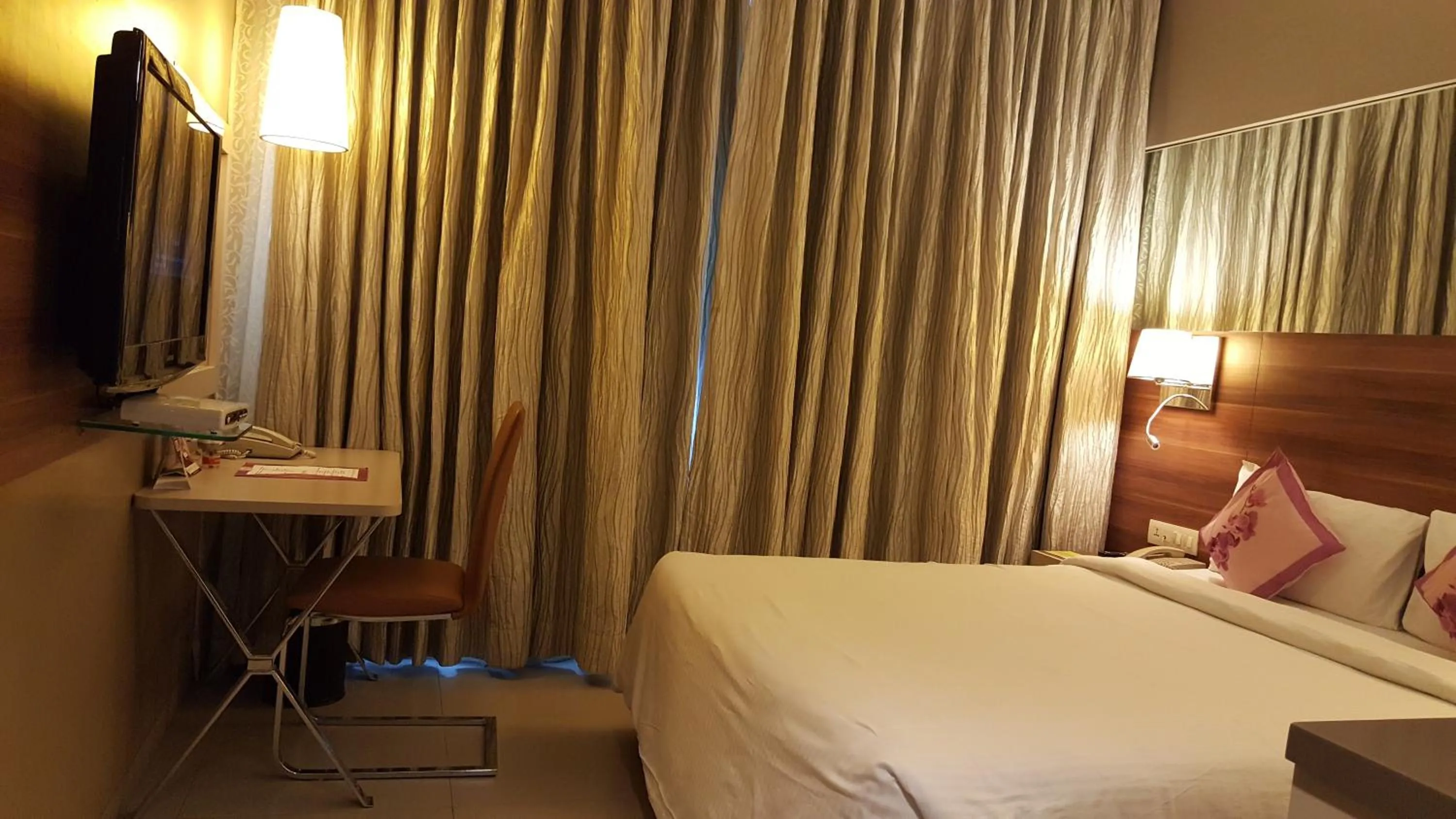 Bed in Royal Orchid Central Vadodara