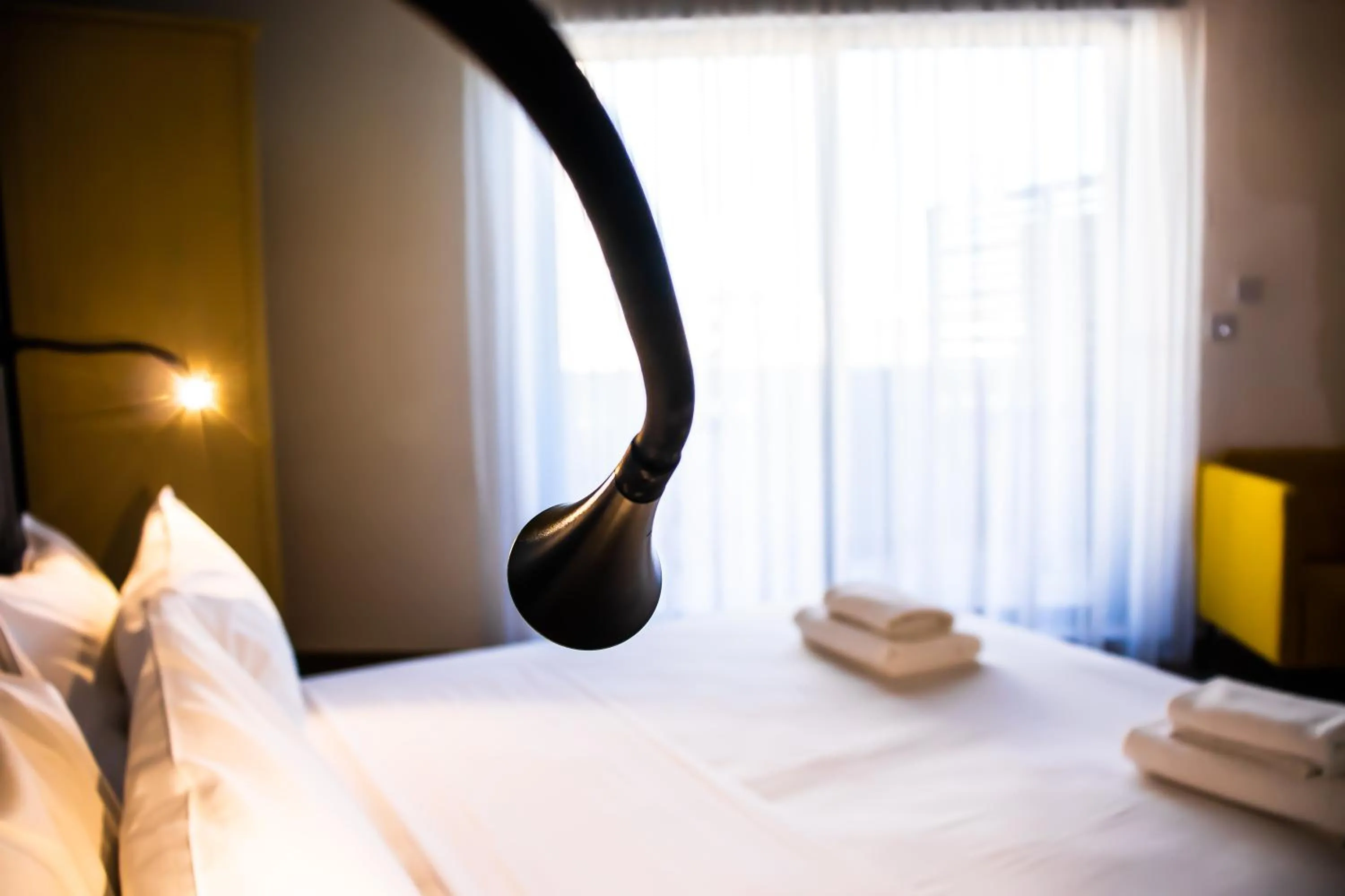 Bed in Chapter 5 Hotel