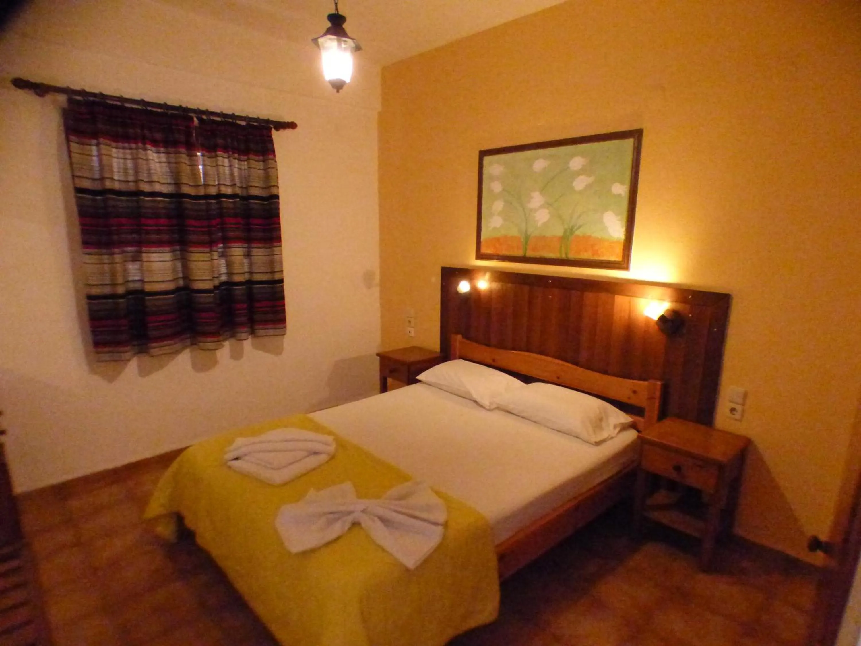 Bed in Eleni Apartments