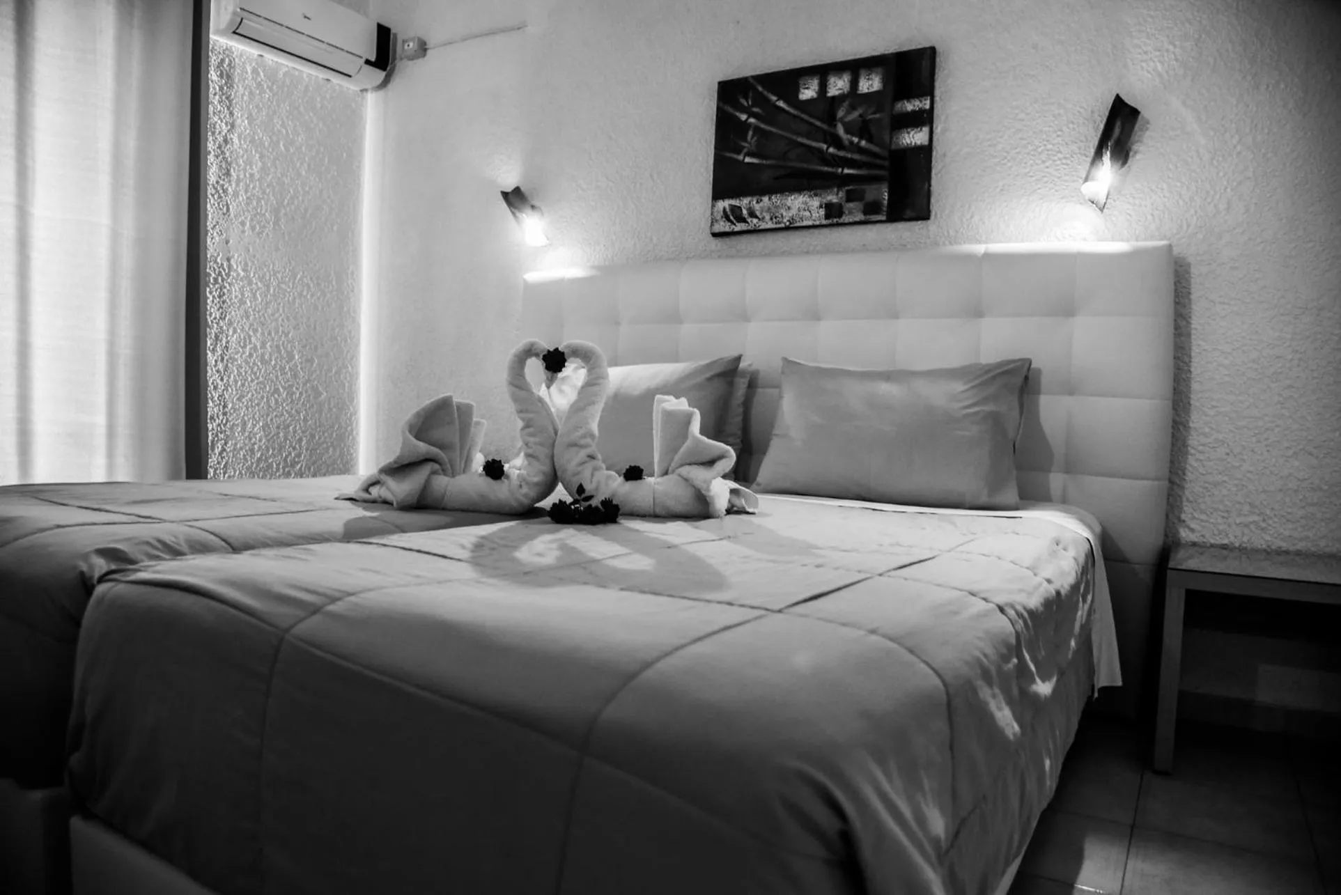 Bed in Vallian Village Hotel