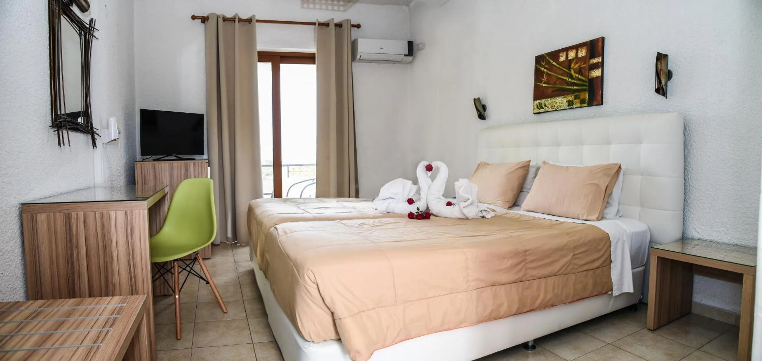 Bed in Vallian Village Hotel