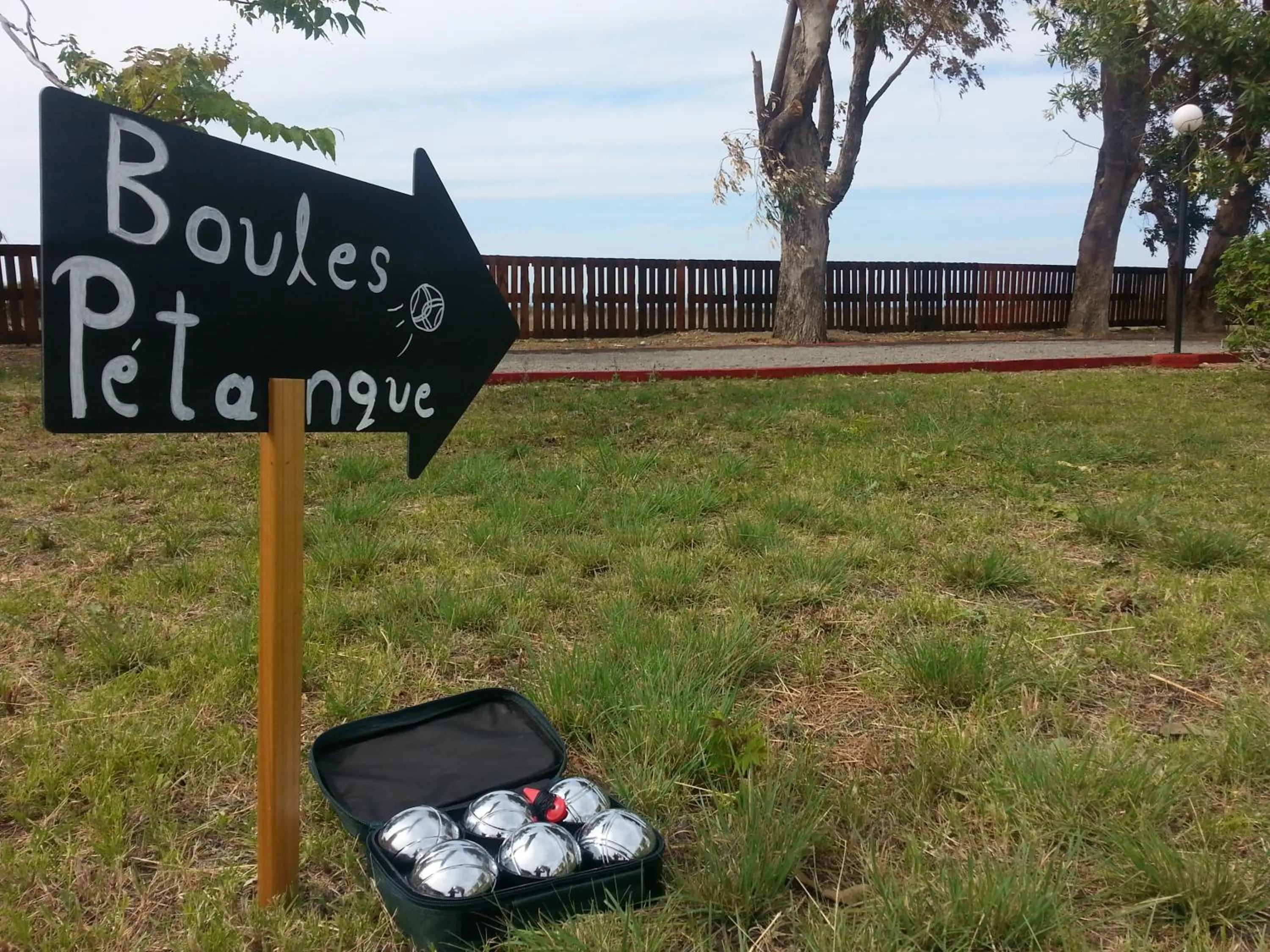 Property logo or sign in Vallian Village Hotel