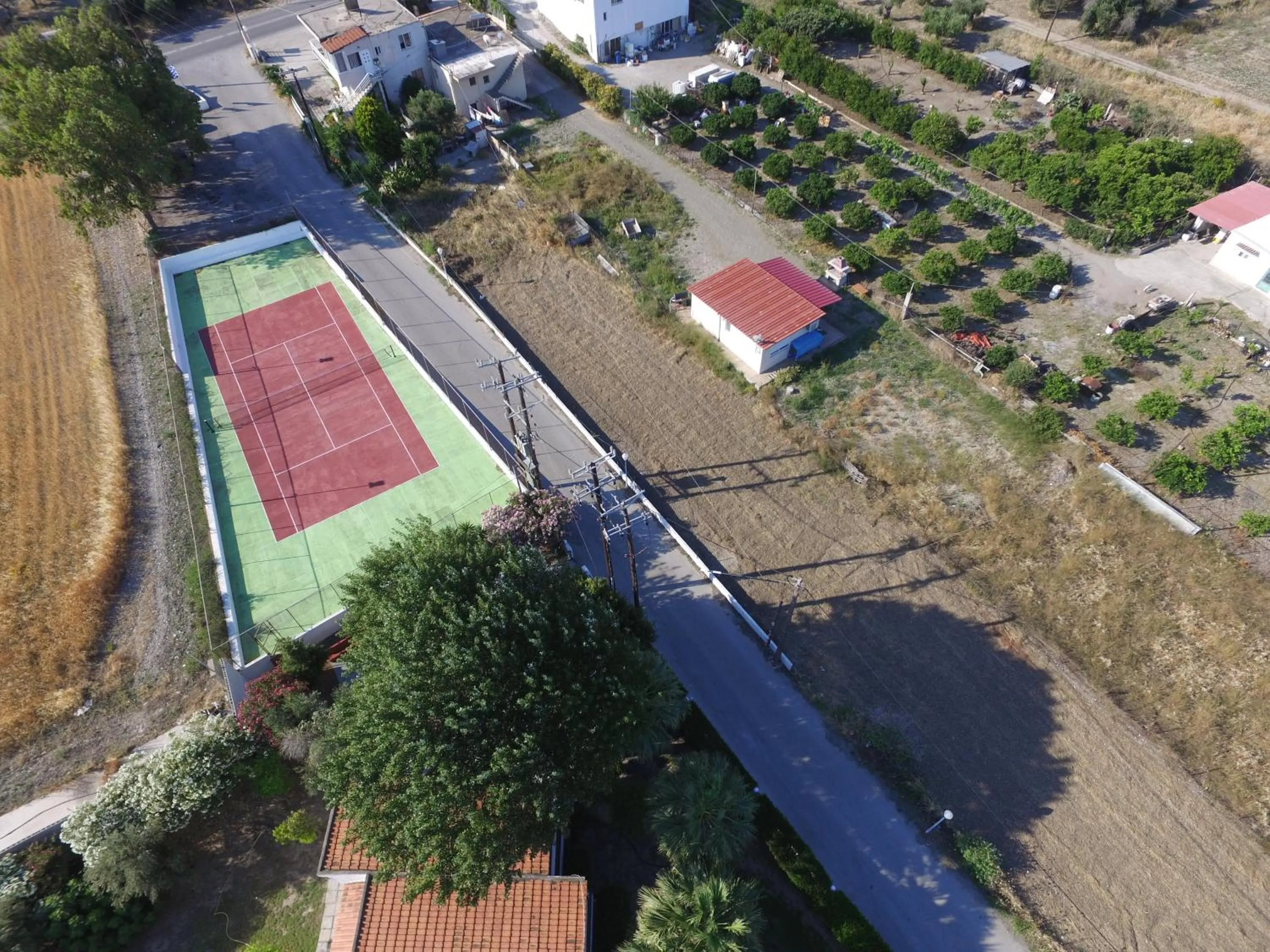 Tennis court in Vallian Village Hotel