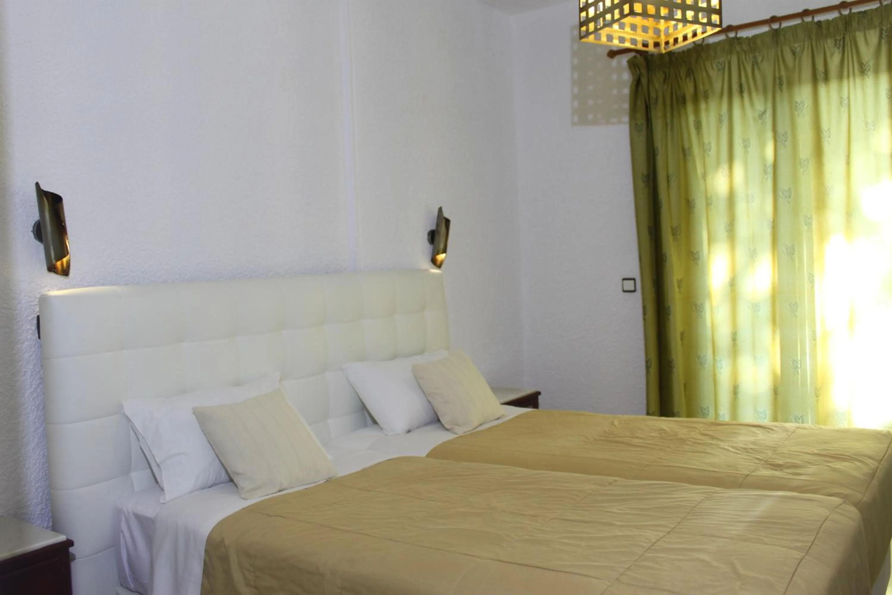 Photo of the whole room in Vallian Village Hotel