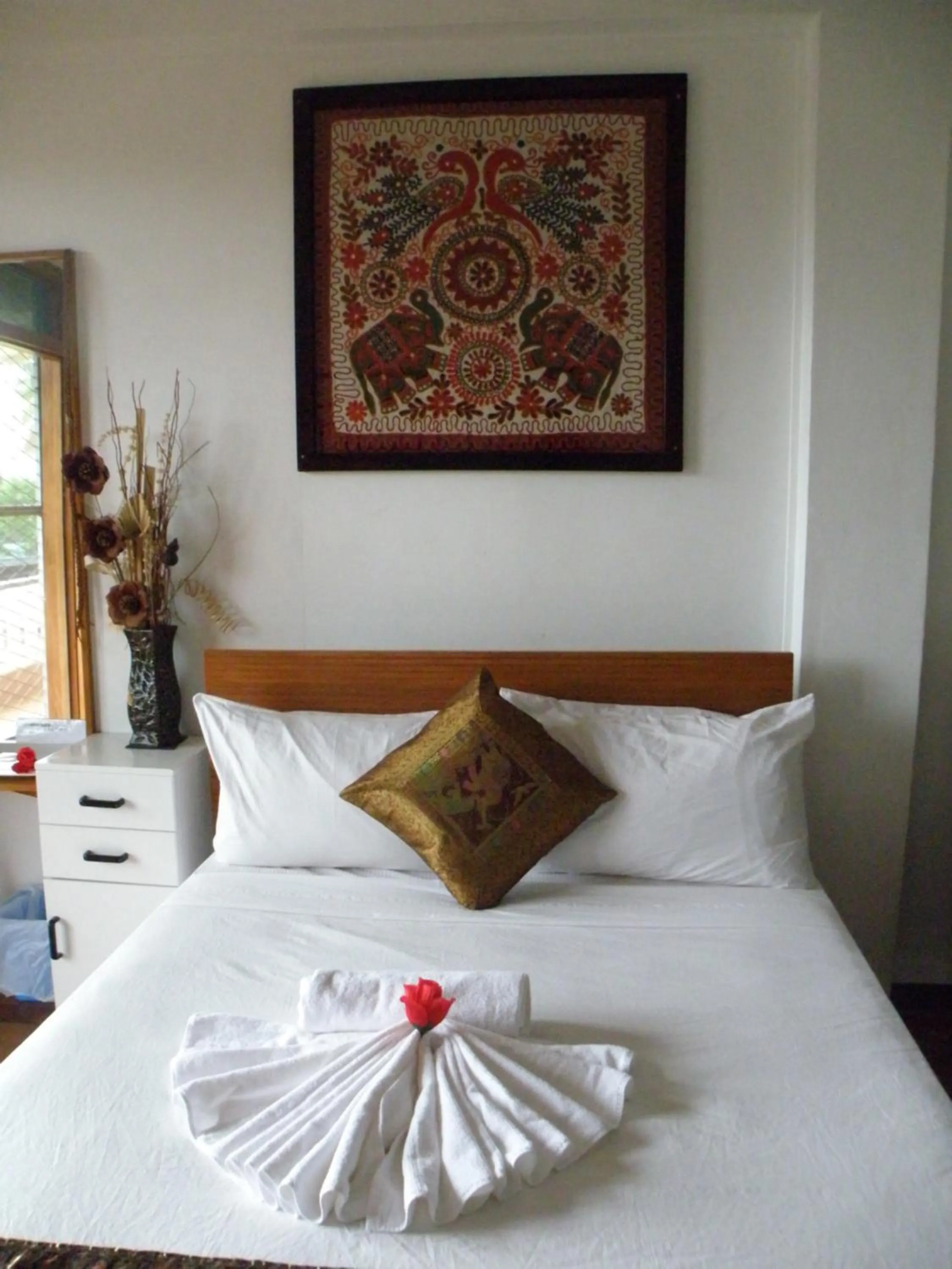 Bed in Tagimoucia House Hotel