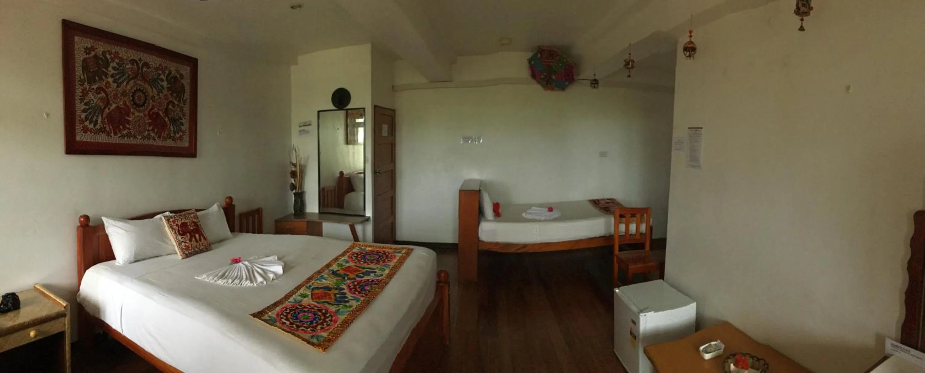 Bed in Tagimoucia House Hotel