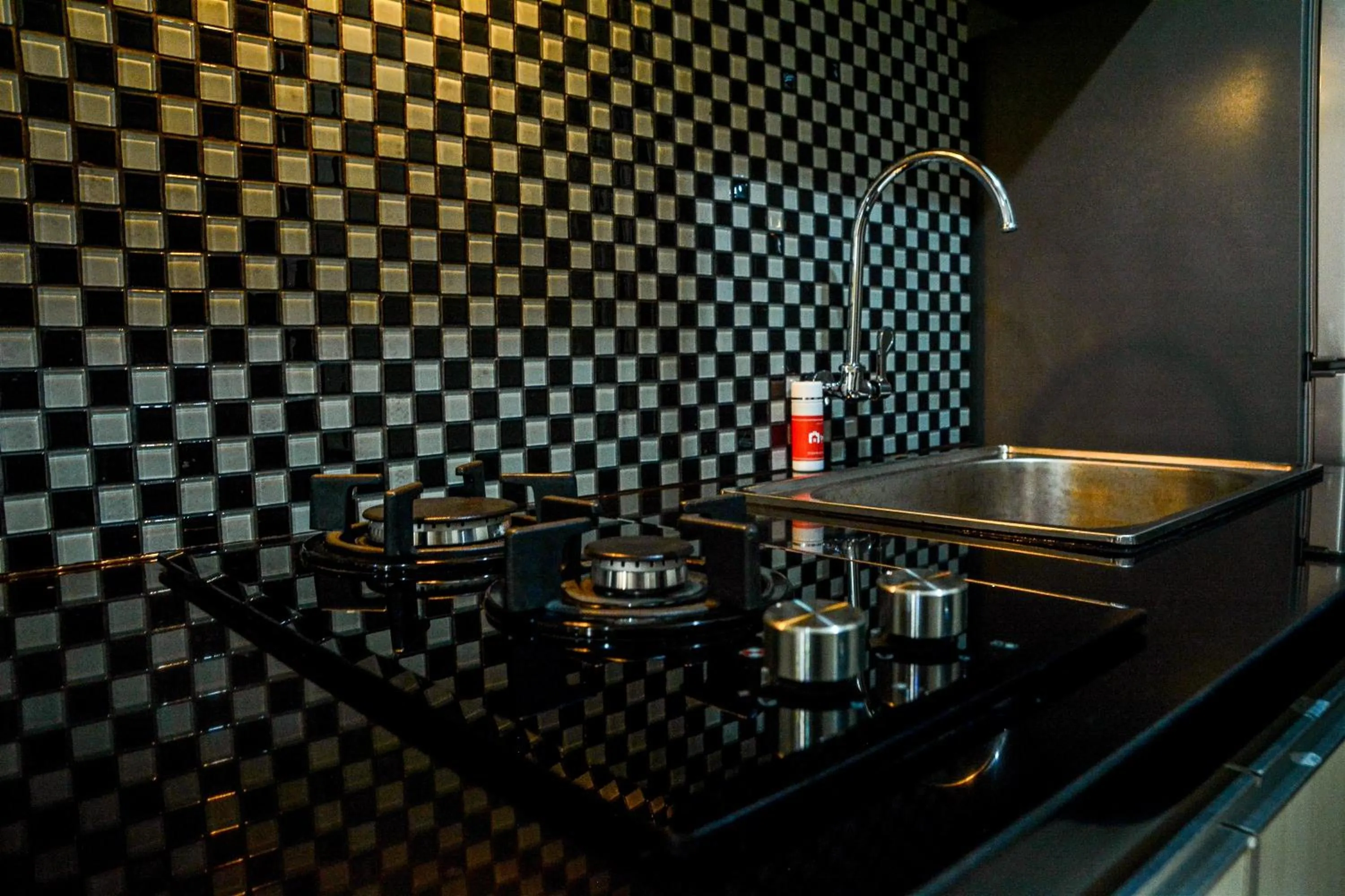 Minimalist Studio Room at Grand Serpong Apartment By Travelio