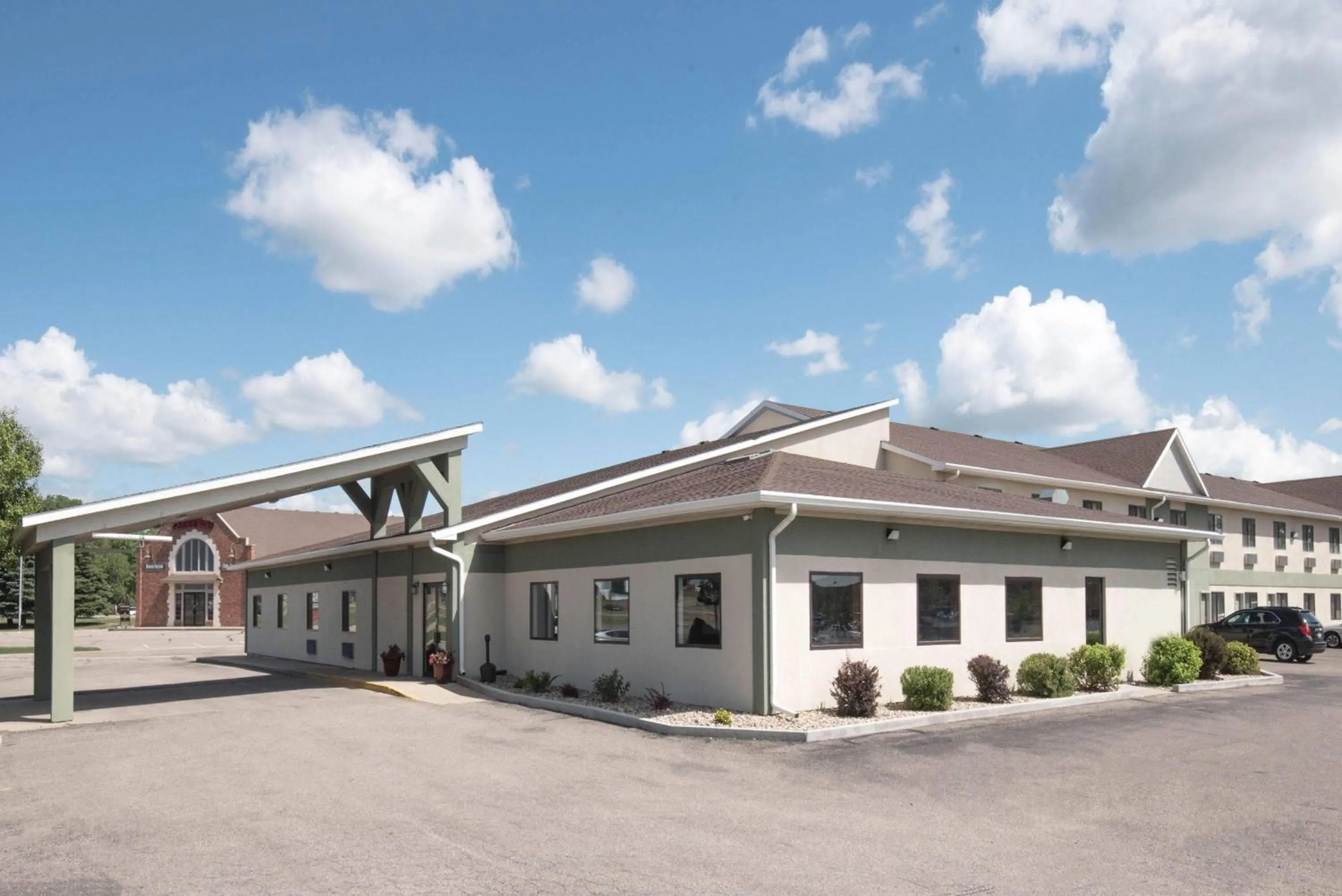Property building in Days Inn by Wyndham Watertown