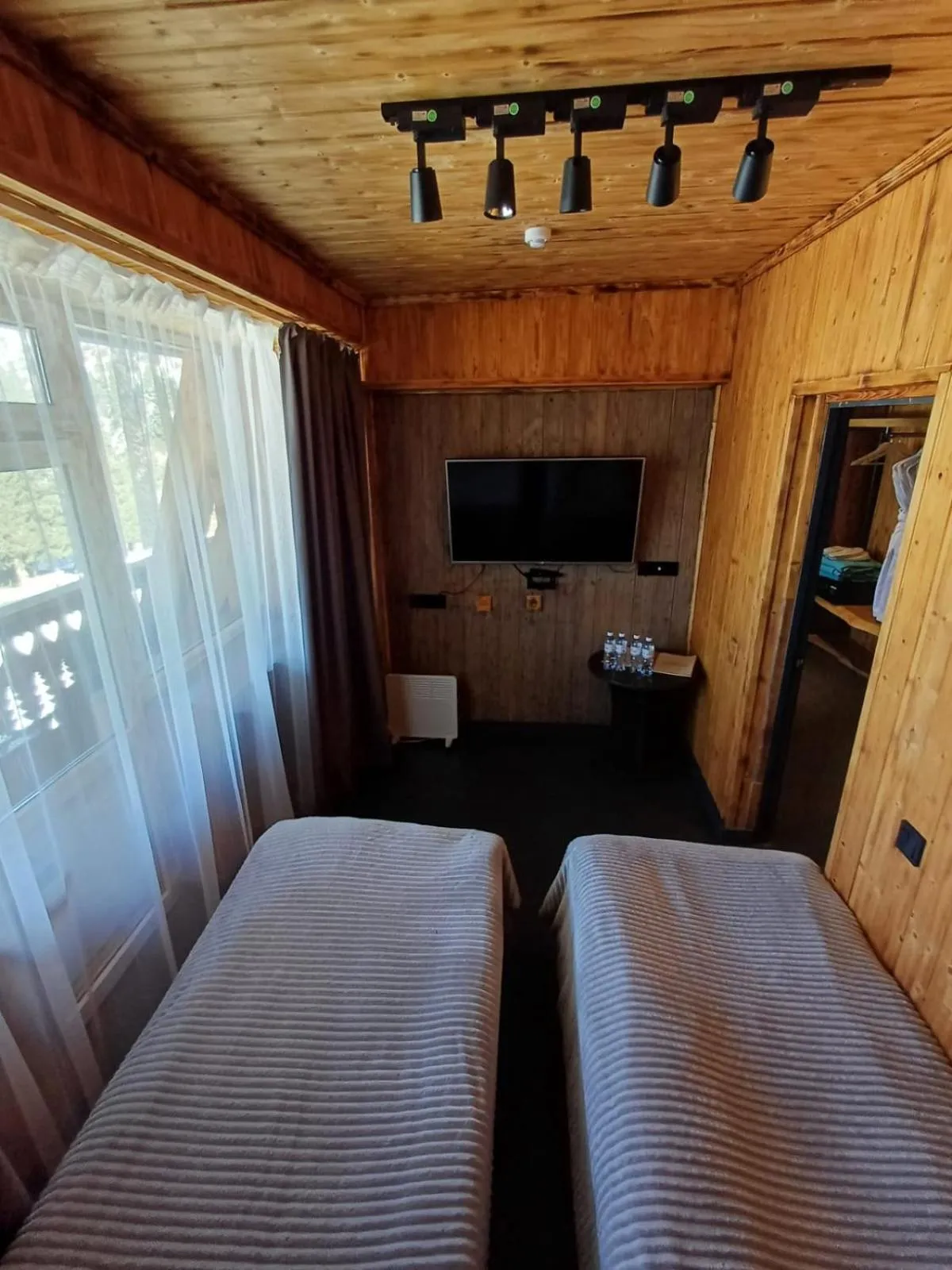 Bed in Shymbulak Resort Hotel