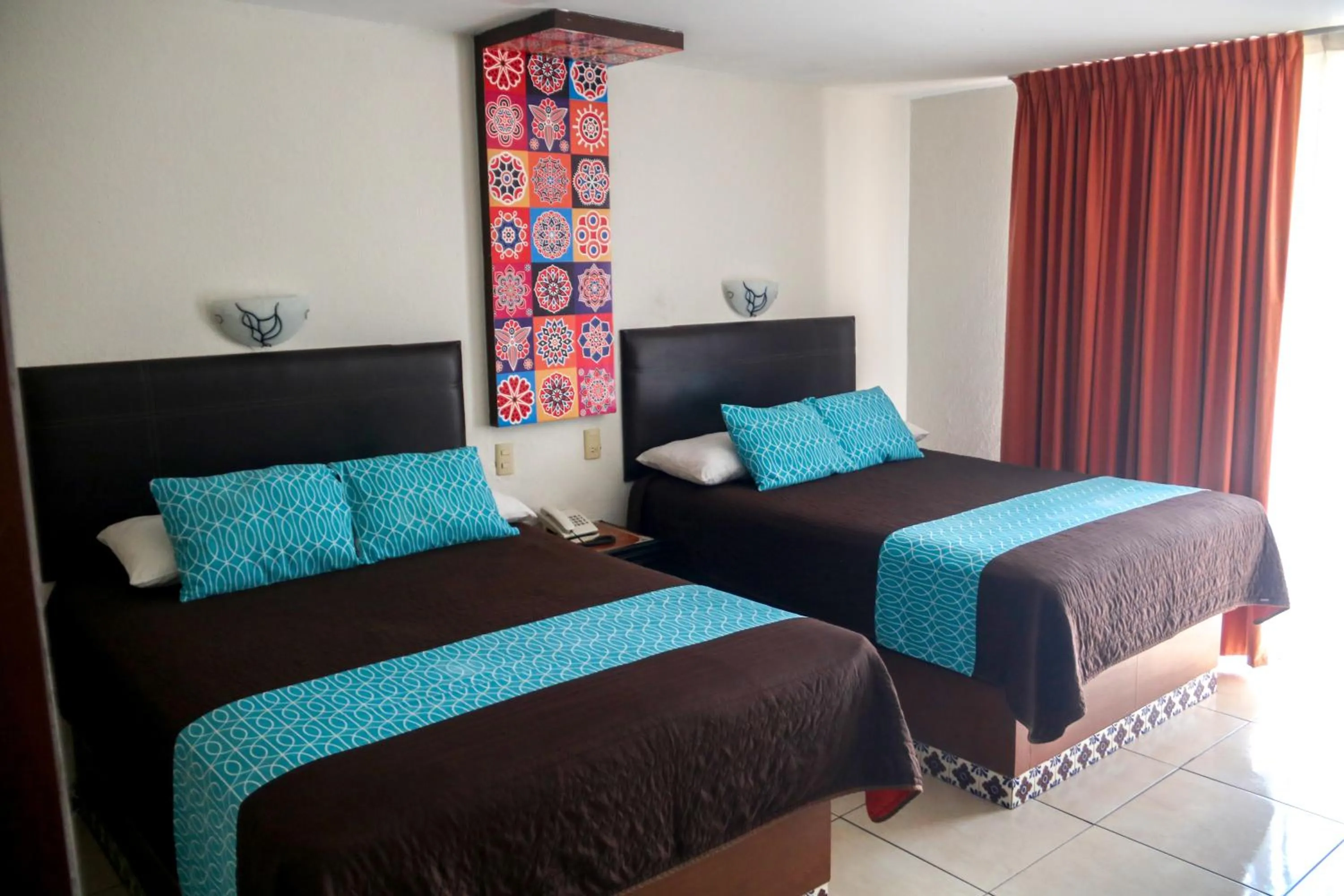 Bed in VF Villa Florencia Hotel