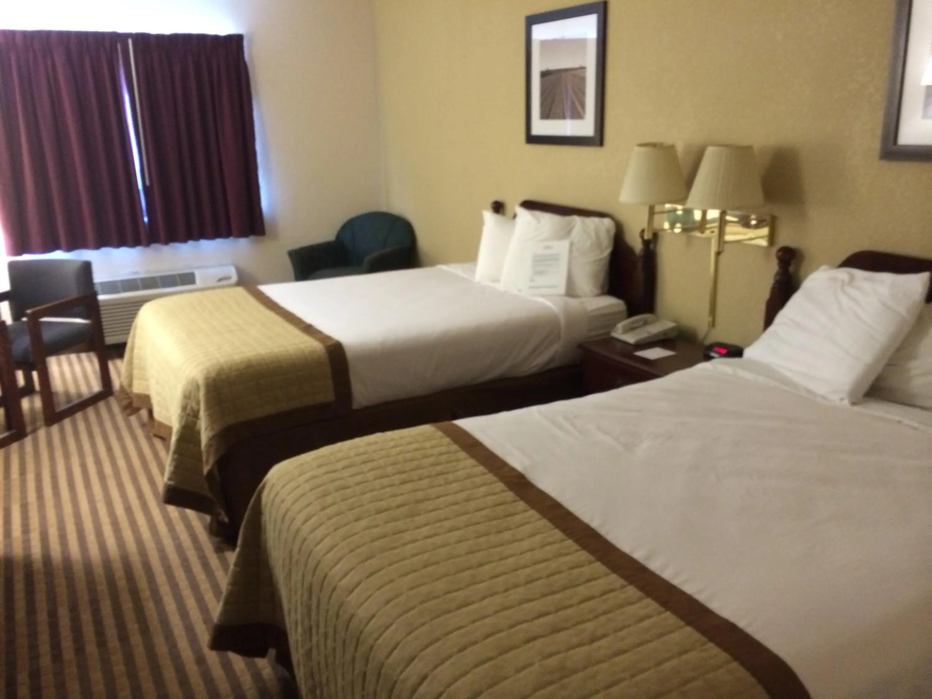 Photo of the whole room in Baymont by Wyndham Metropolis