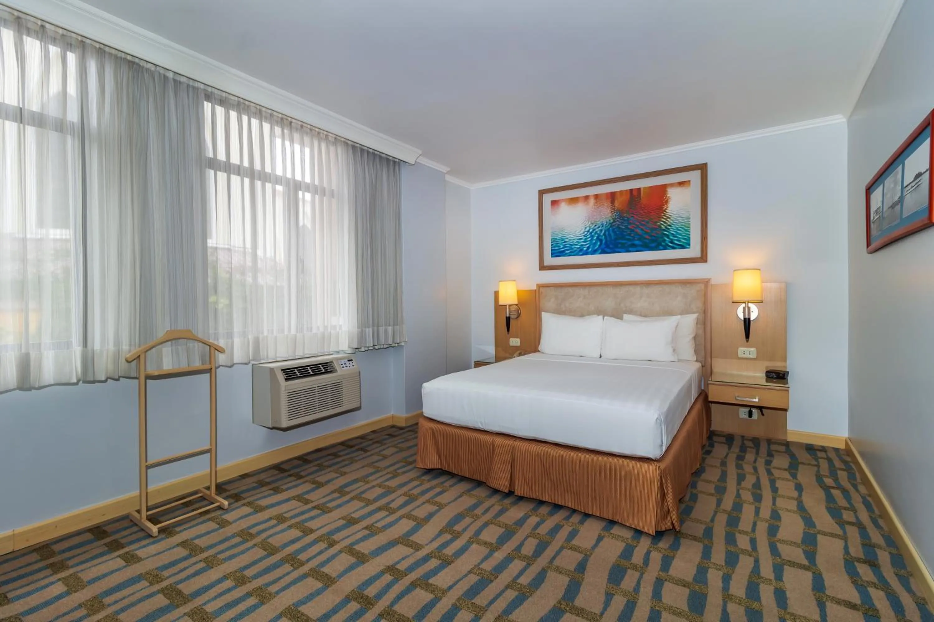 Bedroom, Bed in Grand Hotel Guayaquil, an Ascend Collection Hotel