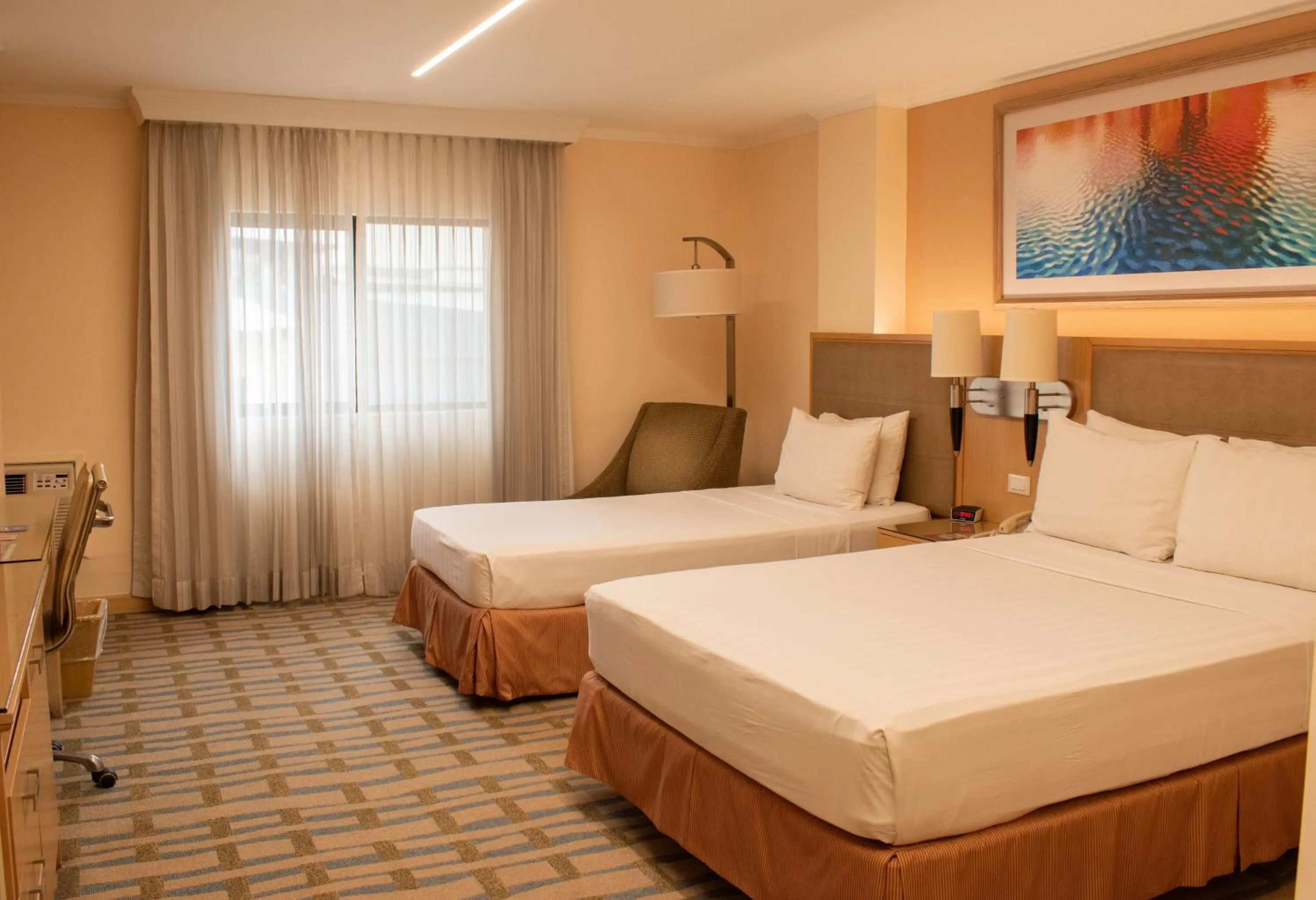 Bed in Grand Hotel Guayaquil, an Ascend Collection Hotel