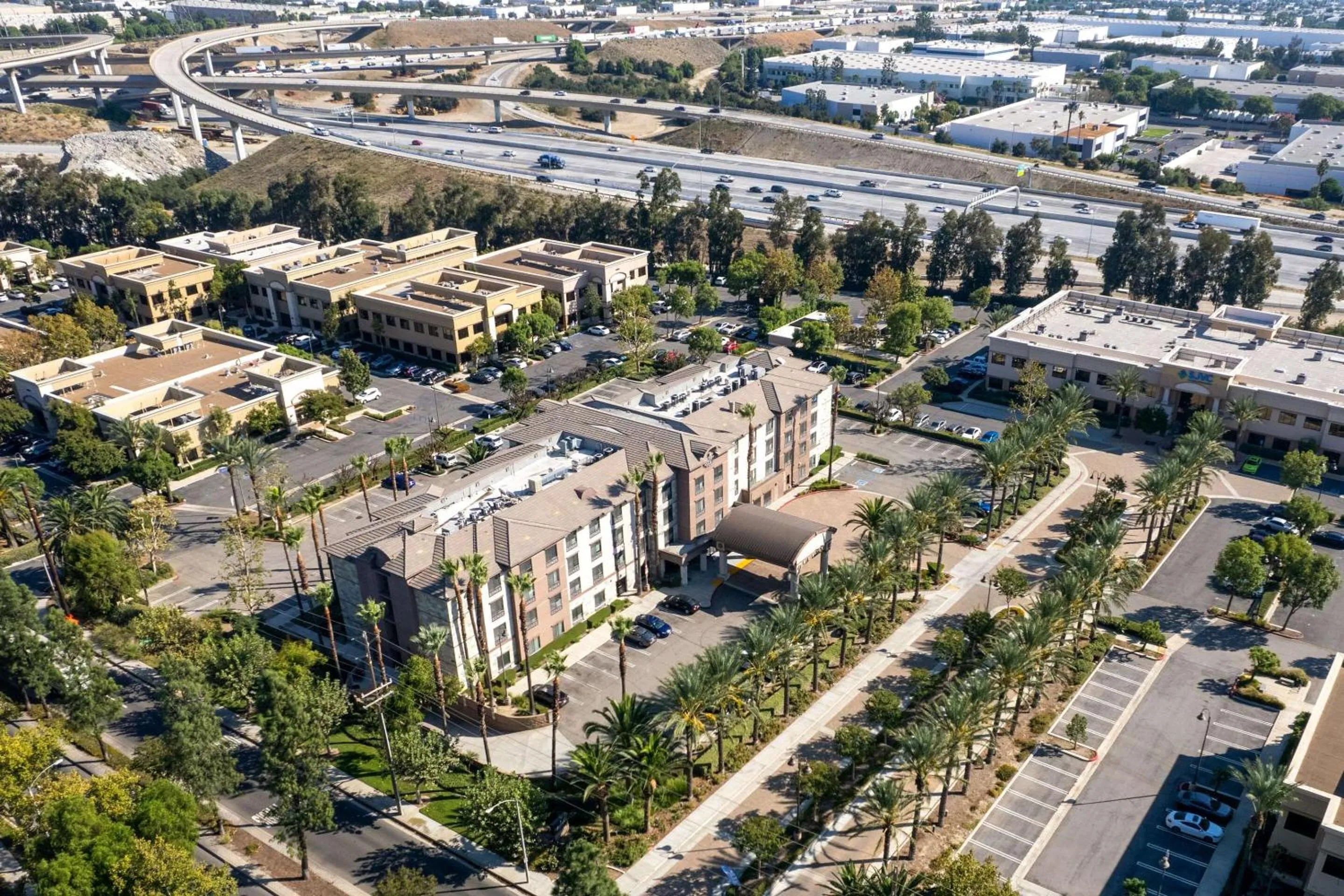 Property building in Country Inn & Suites by Radisson, Ontario at Ontario Mills, CA