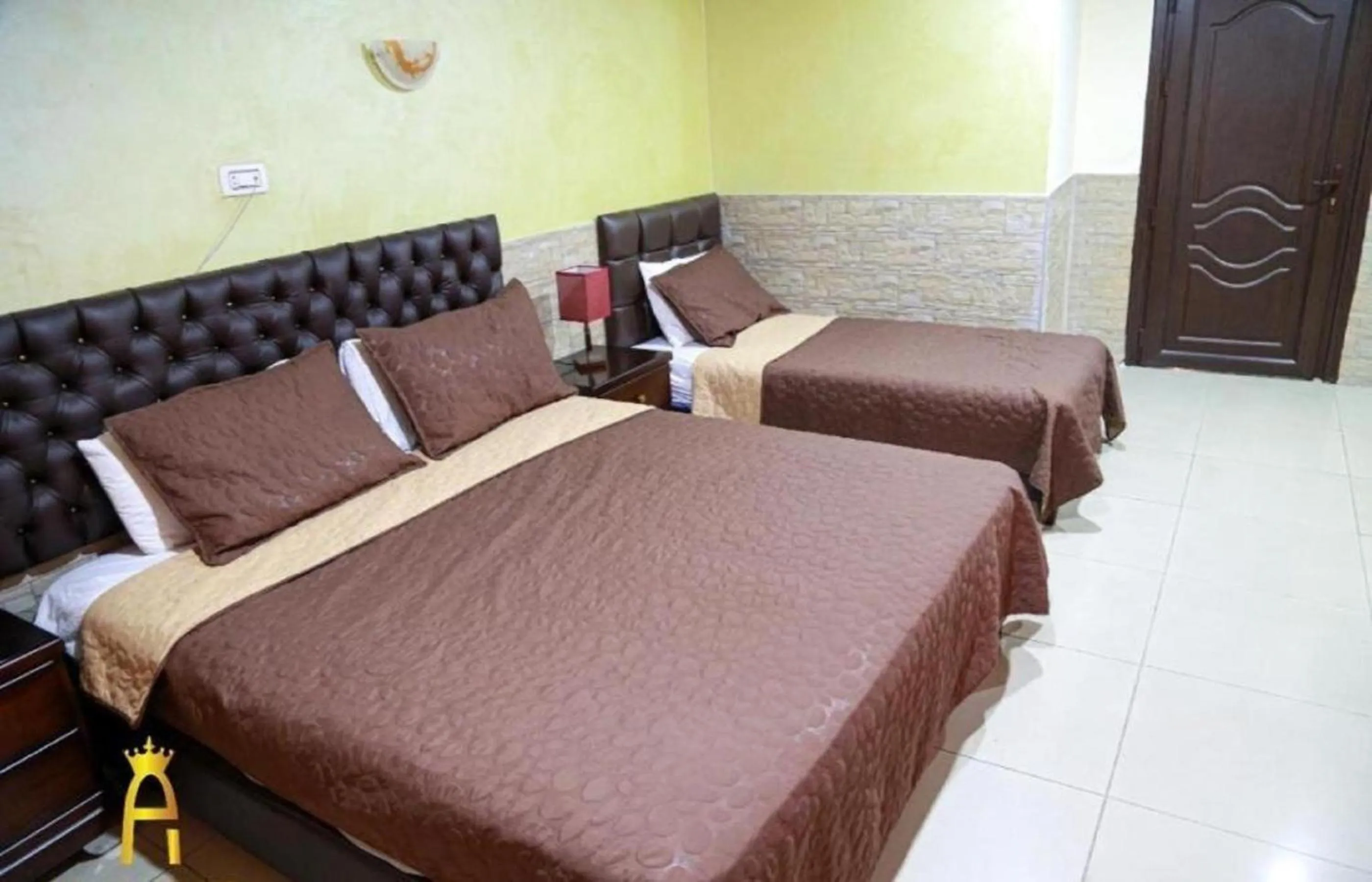 Bed in Amman Palace Hotel