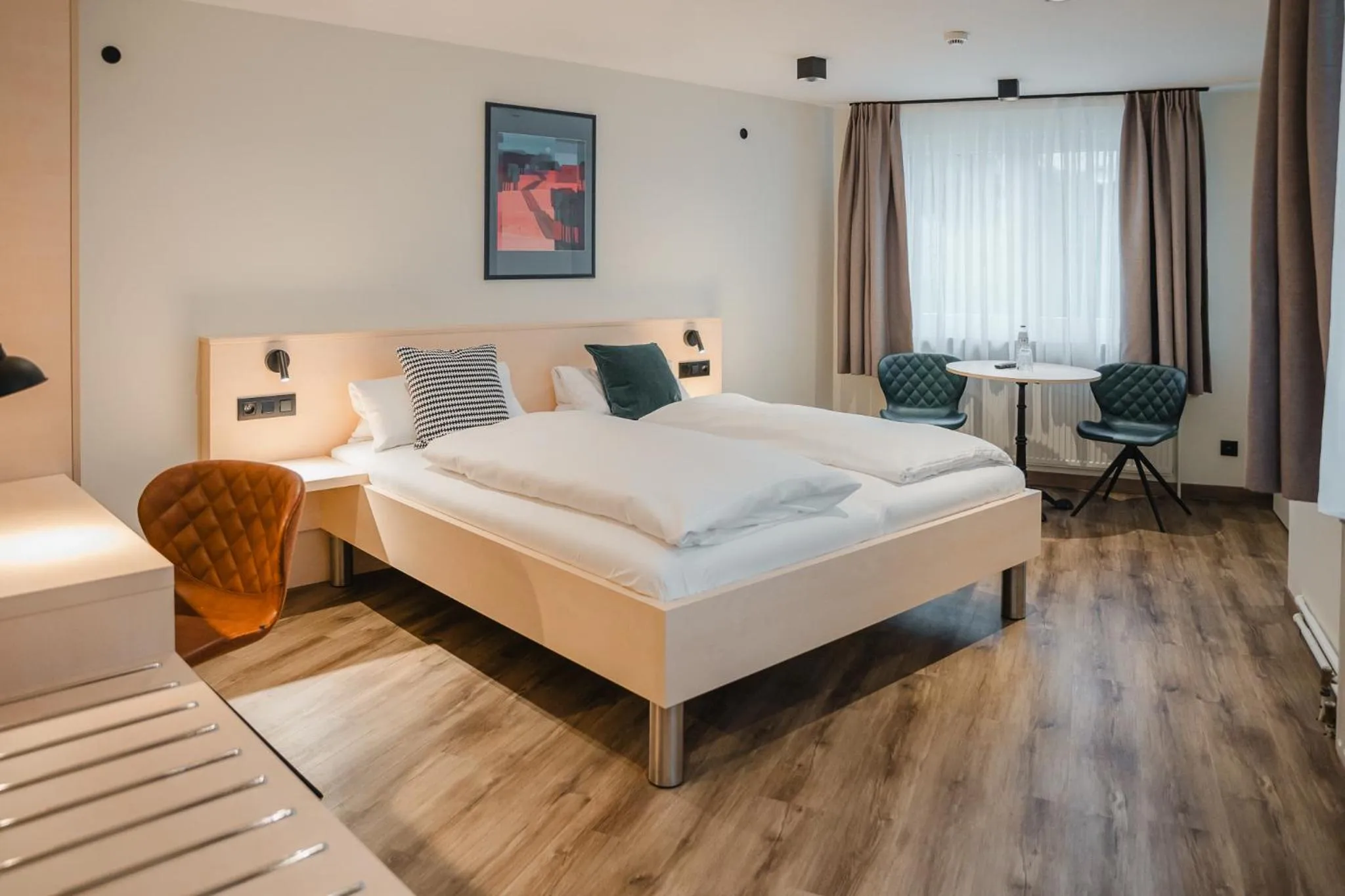 Photo of the whole room, Bed in Hotel Restaurant Tychon AG