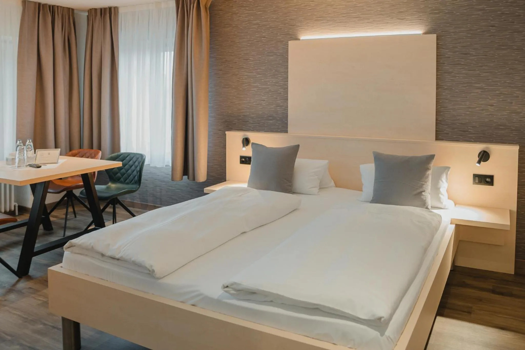 Photo of the whole room, Bed in Hotel Restaurant Tychon AG