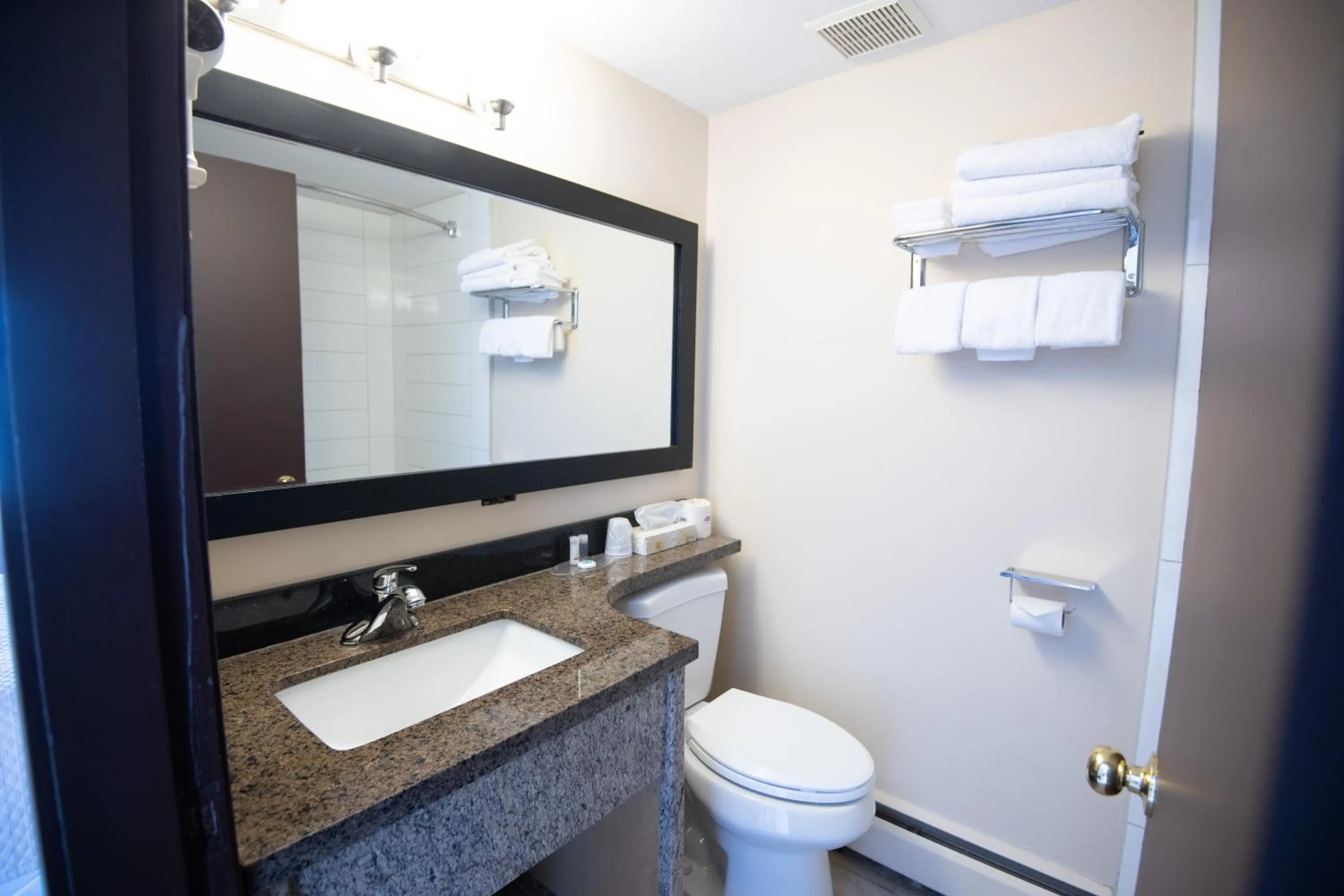 Toilet, Bathroom in North Star Inn & Suites