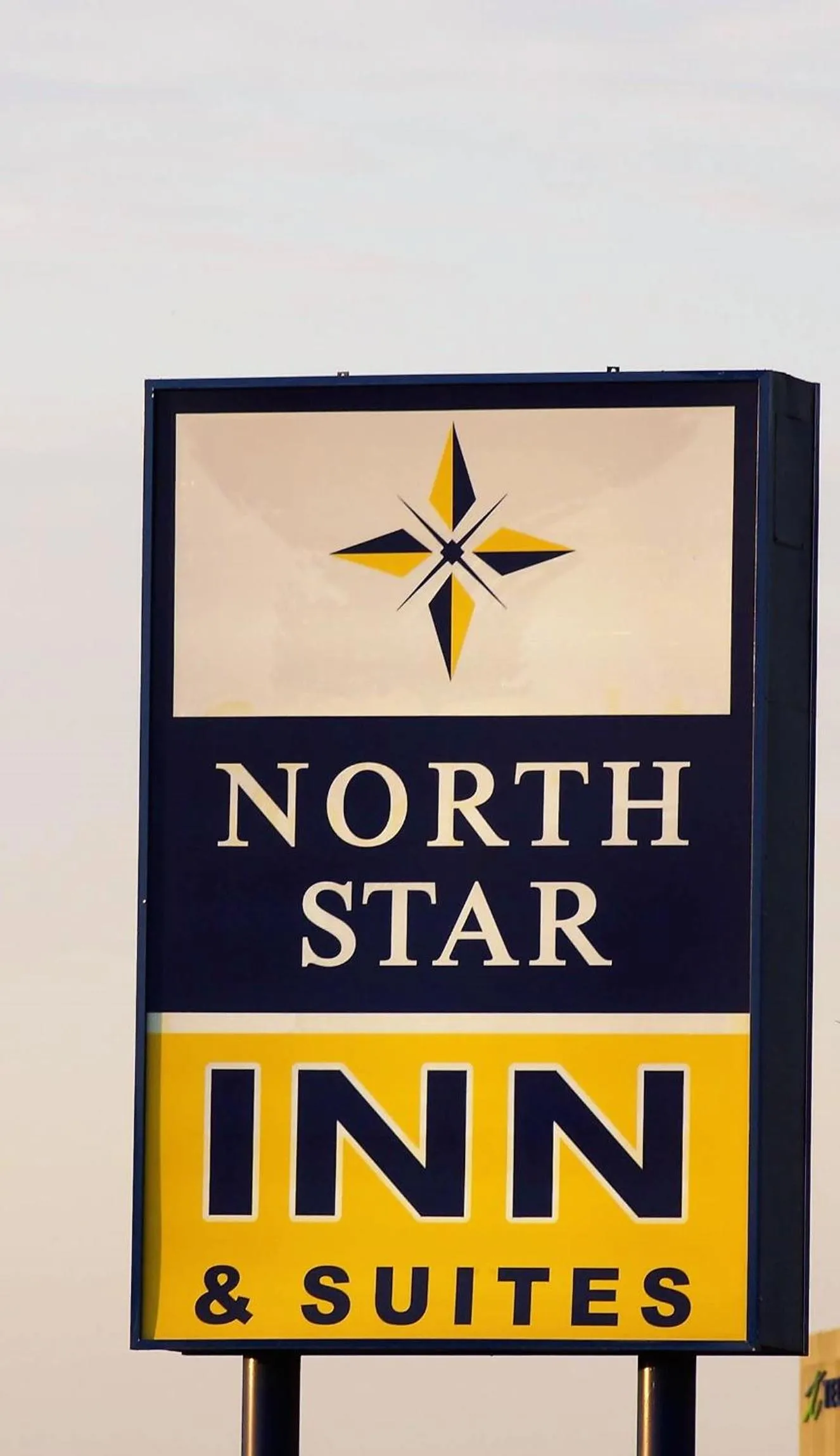Property logo or sign in North Star Inn & Suites