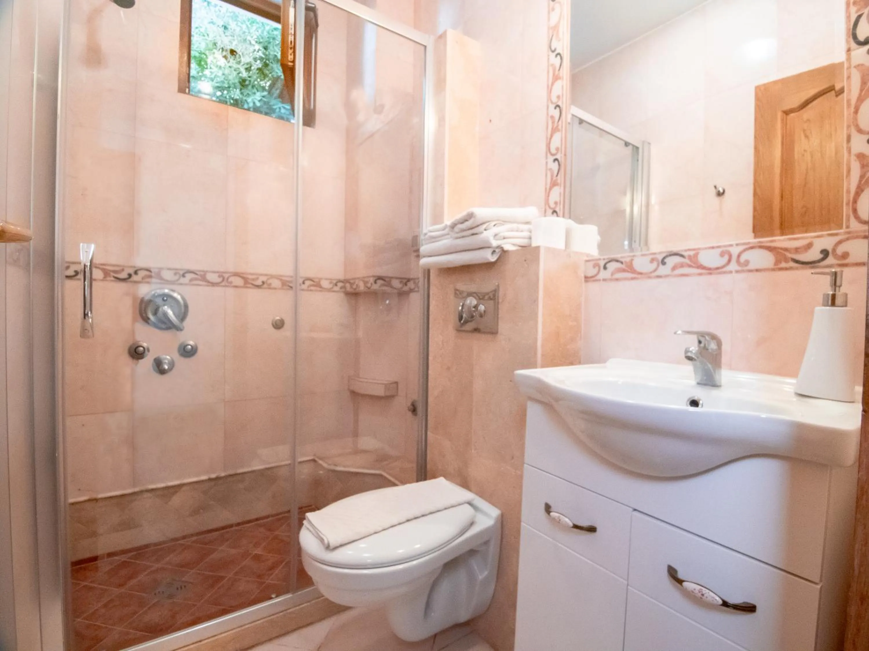 Toilet in Apartments and Rooms Levantin Inn