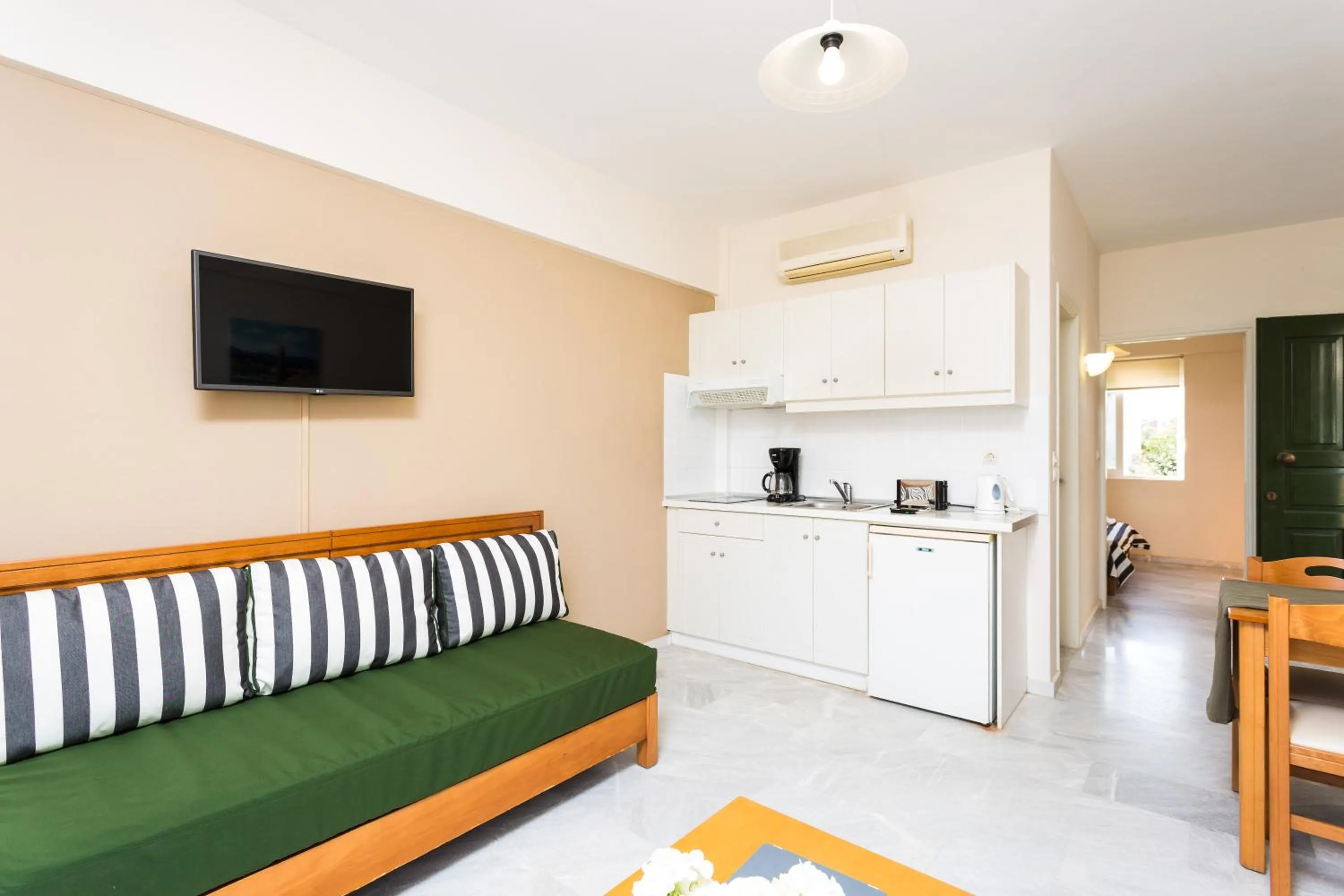 Kitchen or kitchenette in Radamanthy's Hotel Apartments