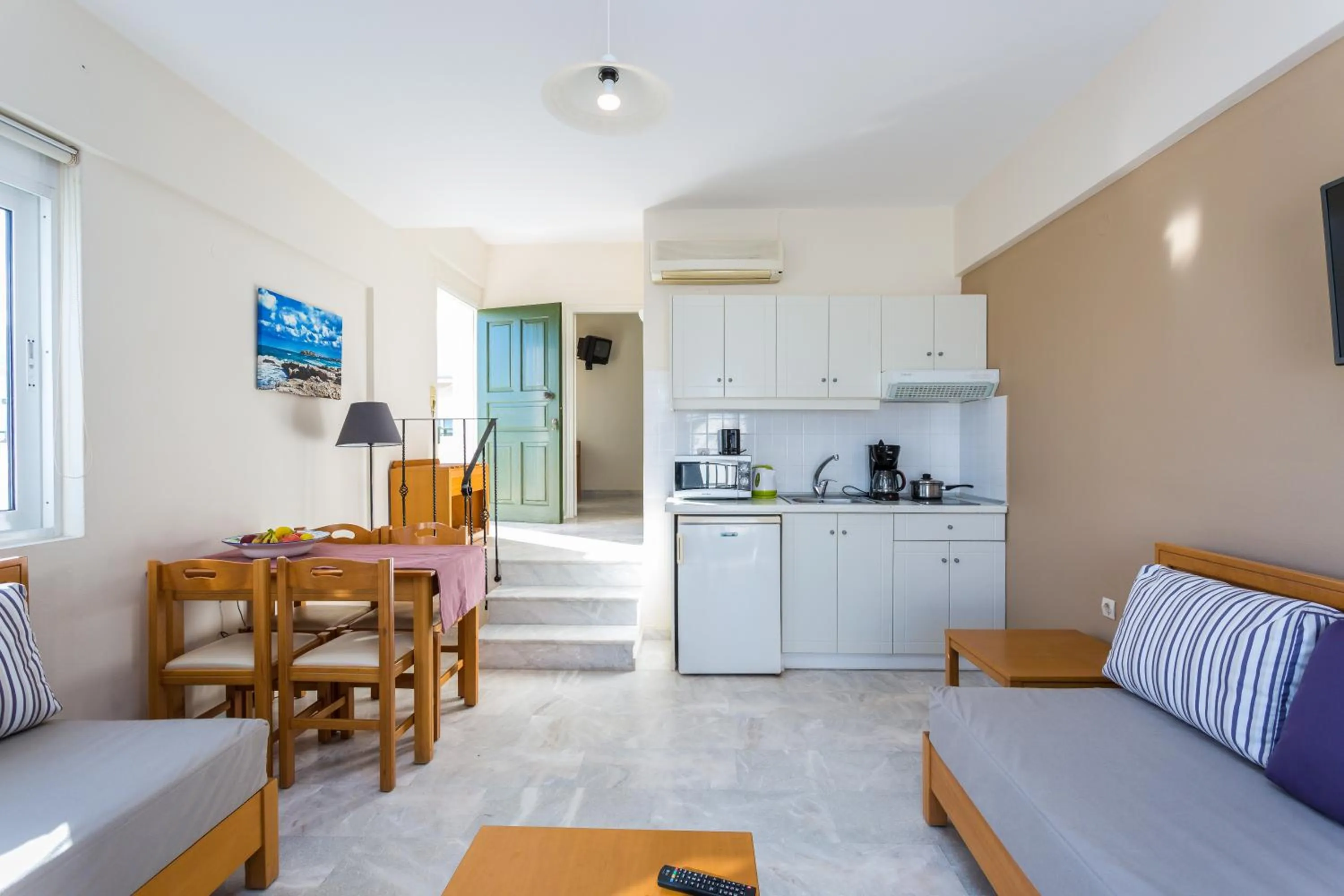 Kitchen or kitchenette in Radamanthy's Hotel Apartments