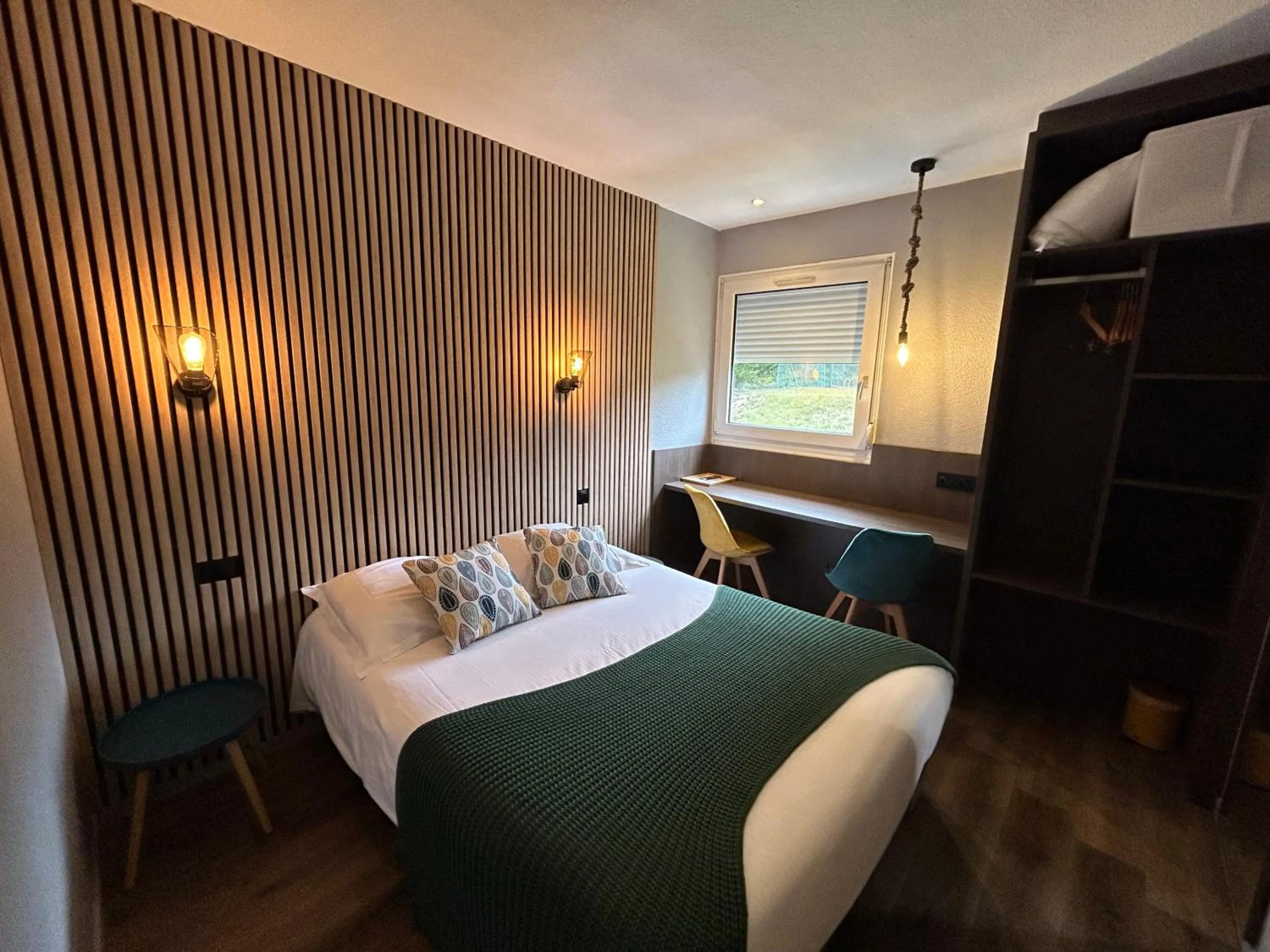 Bed in Les Orchidées , Hôtel & Restaurant