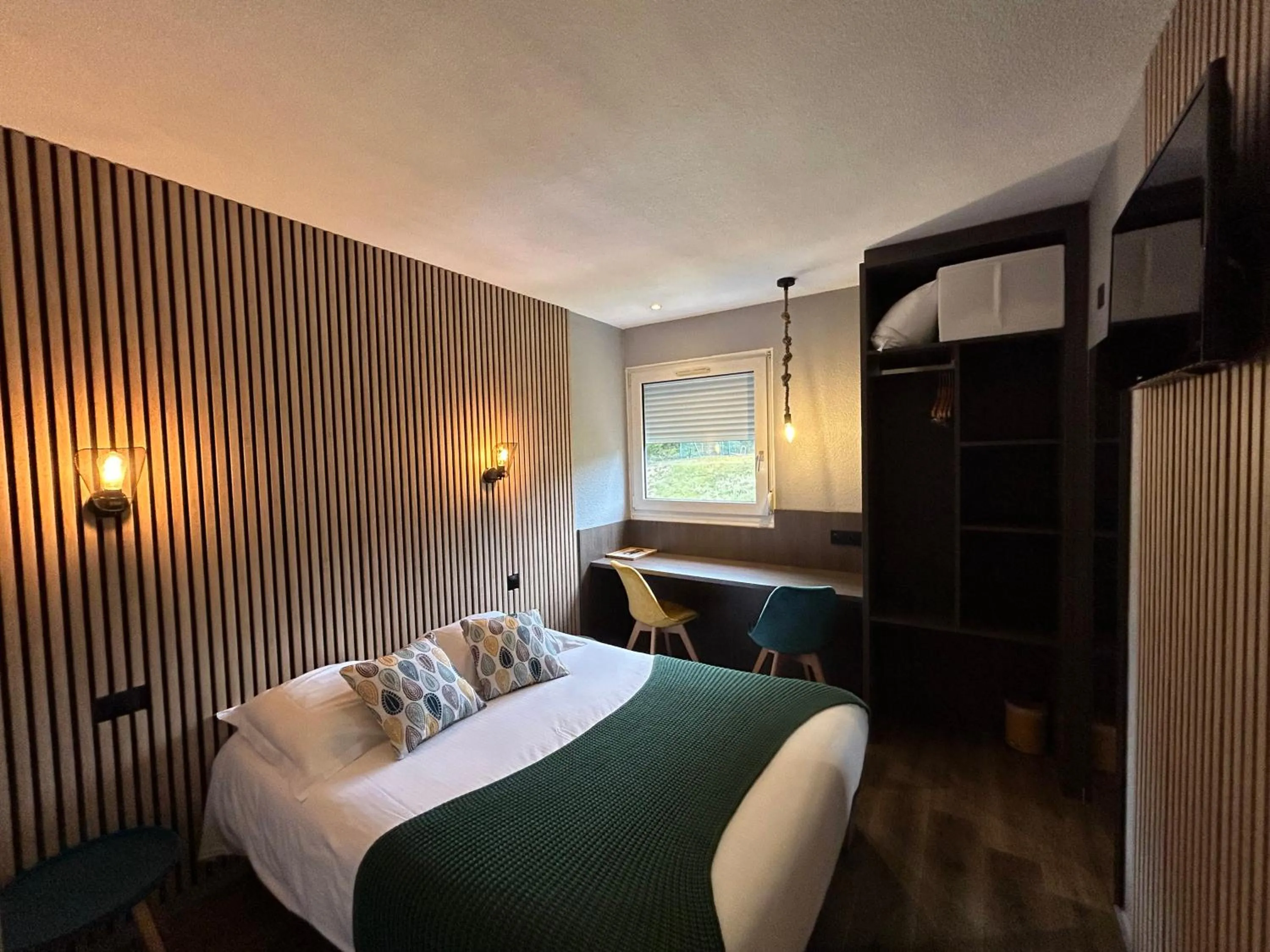 Bed in Les Orchidées , Hôtel & Restaurant