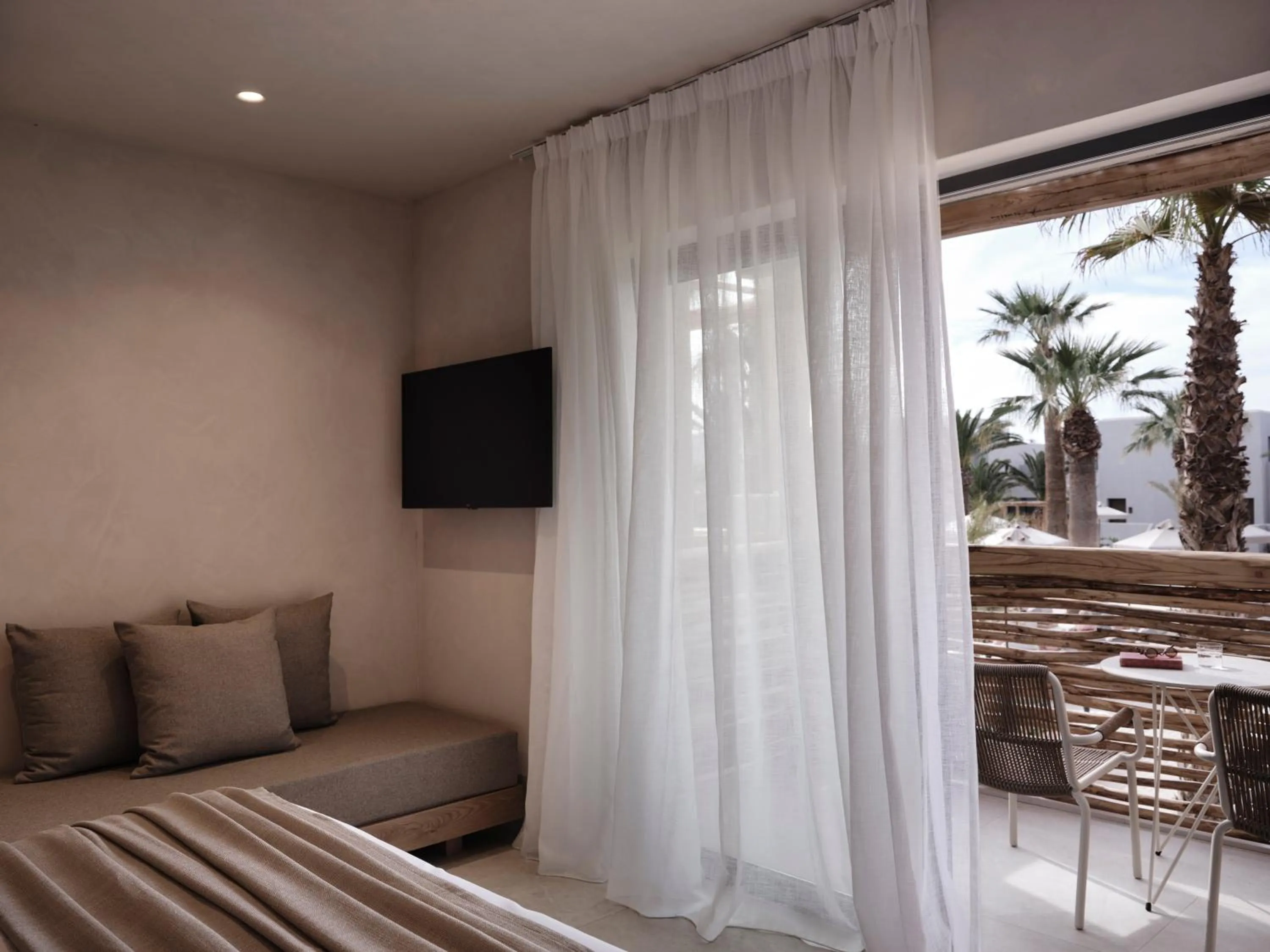 Bed in Stella Blue Seaside Resort