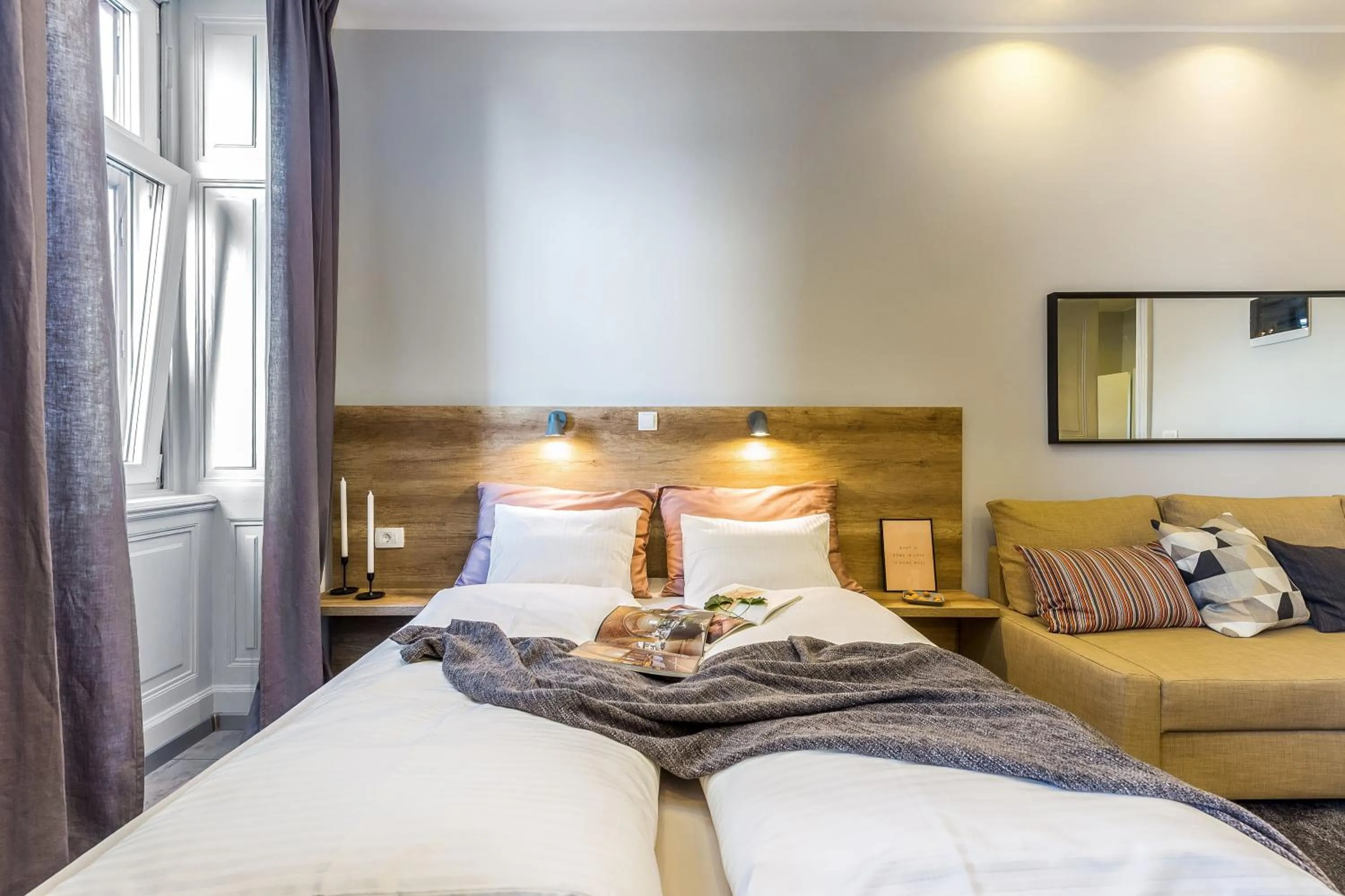 Seating area, Bed in Number 1 Deluxe Apartments