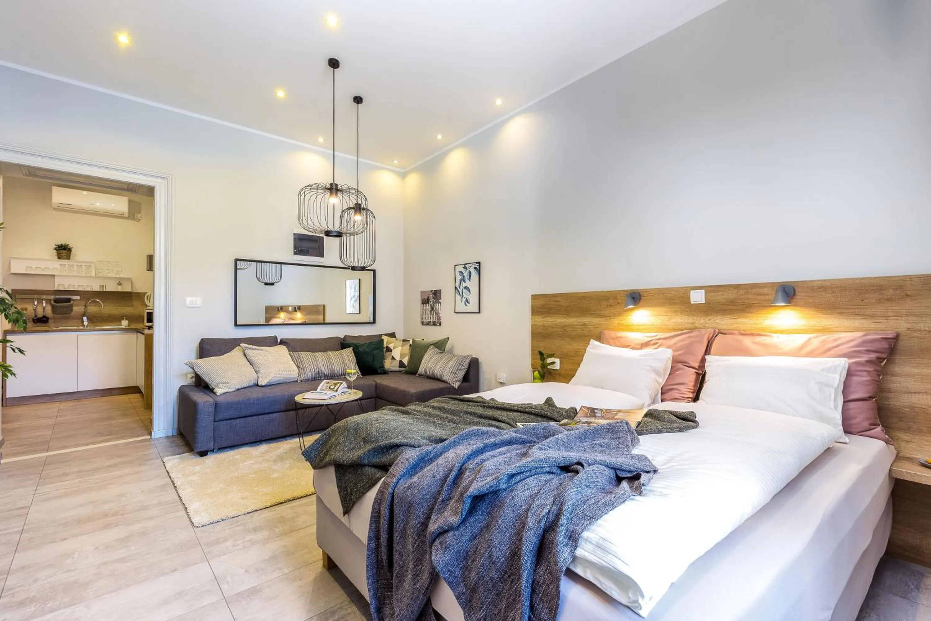 Living room, Bed in Number 1 Deluxe Apartments