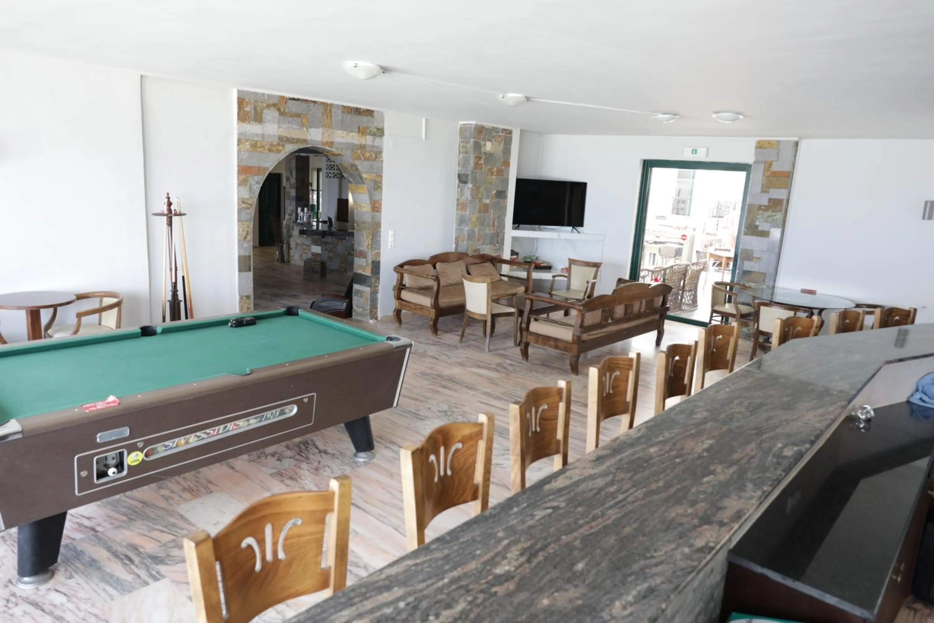 Communal lounge/ TV room in Diogenis Blue Palace