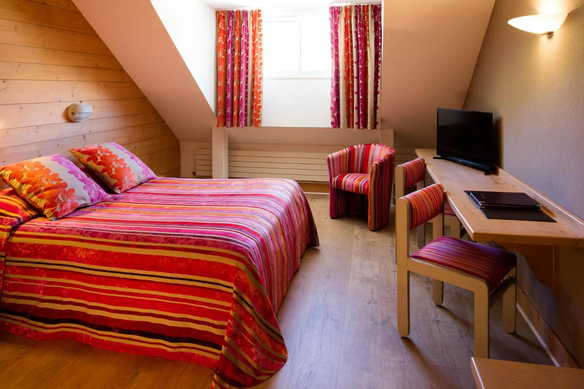 Bed in Hotel le Chalet