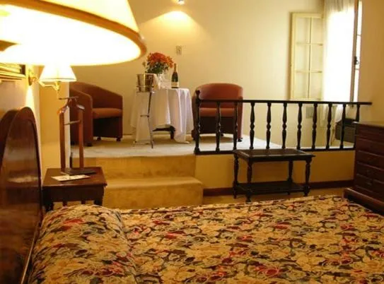 Seating area, Bed in Hotel Glória Resort & Convention