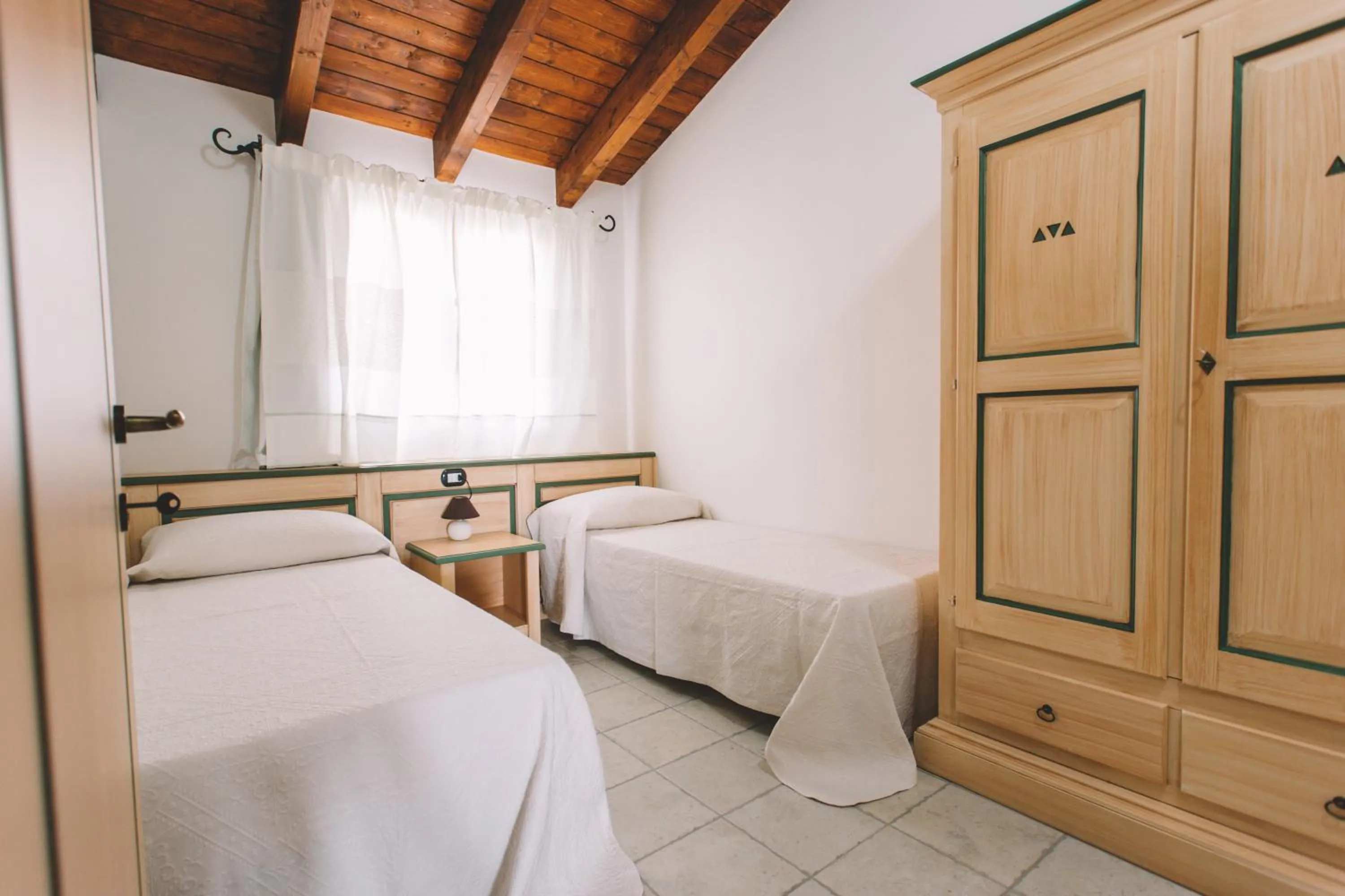 Bedroom in Sole d'Estate Agriresidence