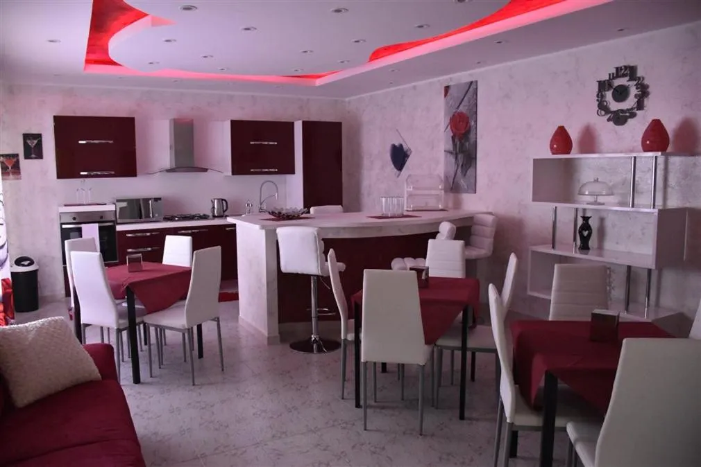 Communal lounge/ TV room in Il Cuore dell'Etna