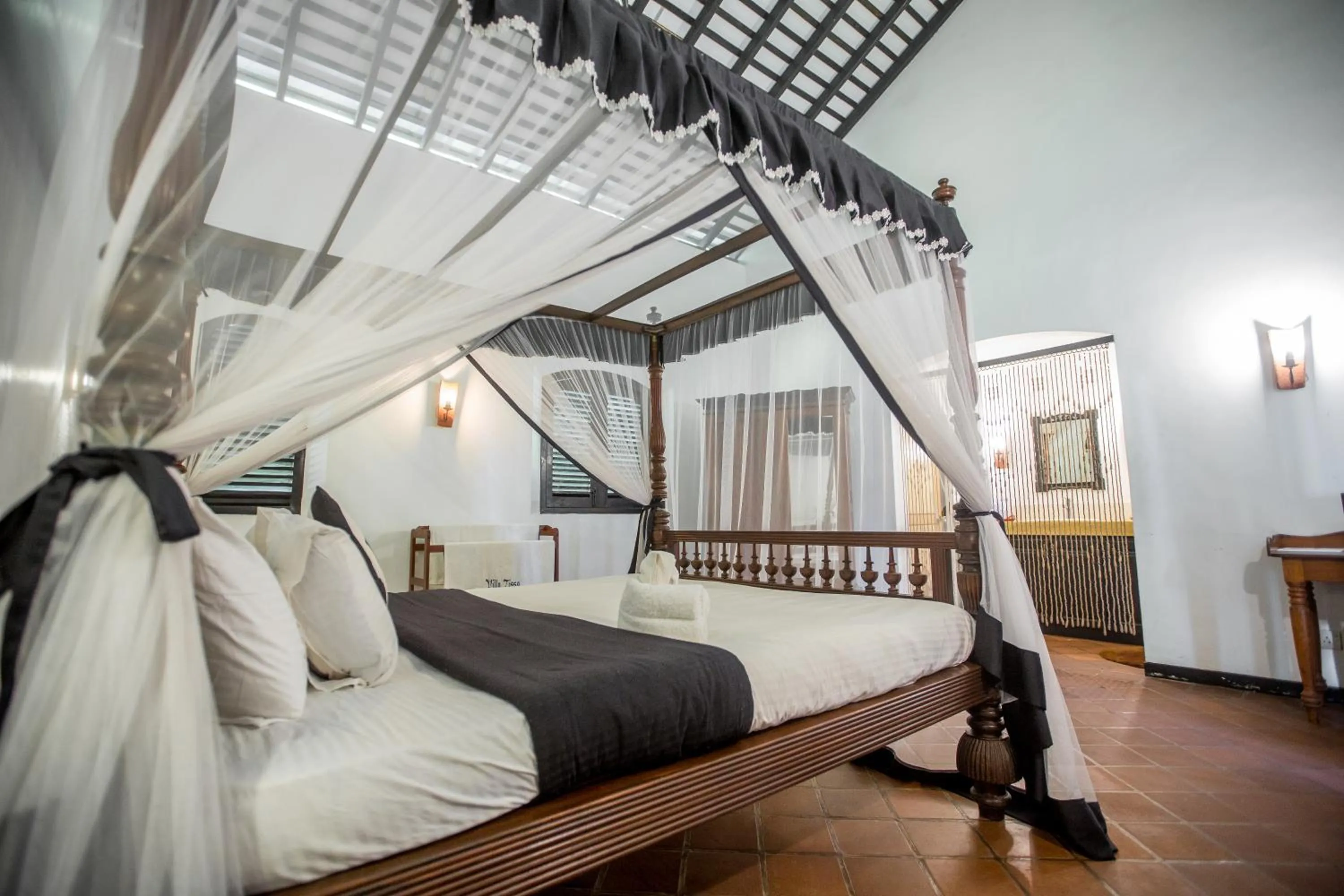 Bed in Villa Tissa Beach Resort