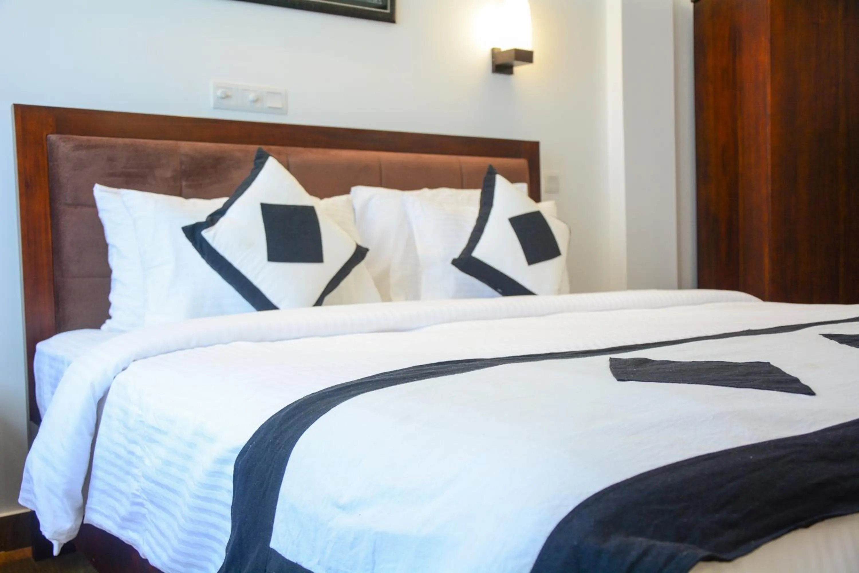 Bed in Villa Tissa Beach Resort