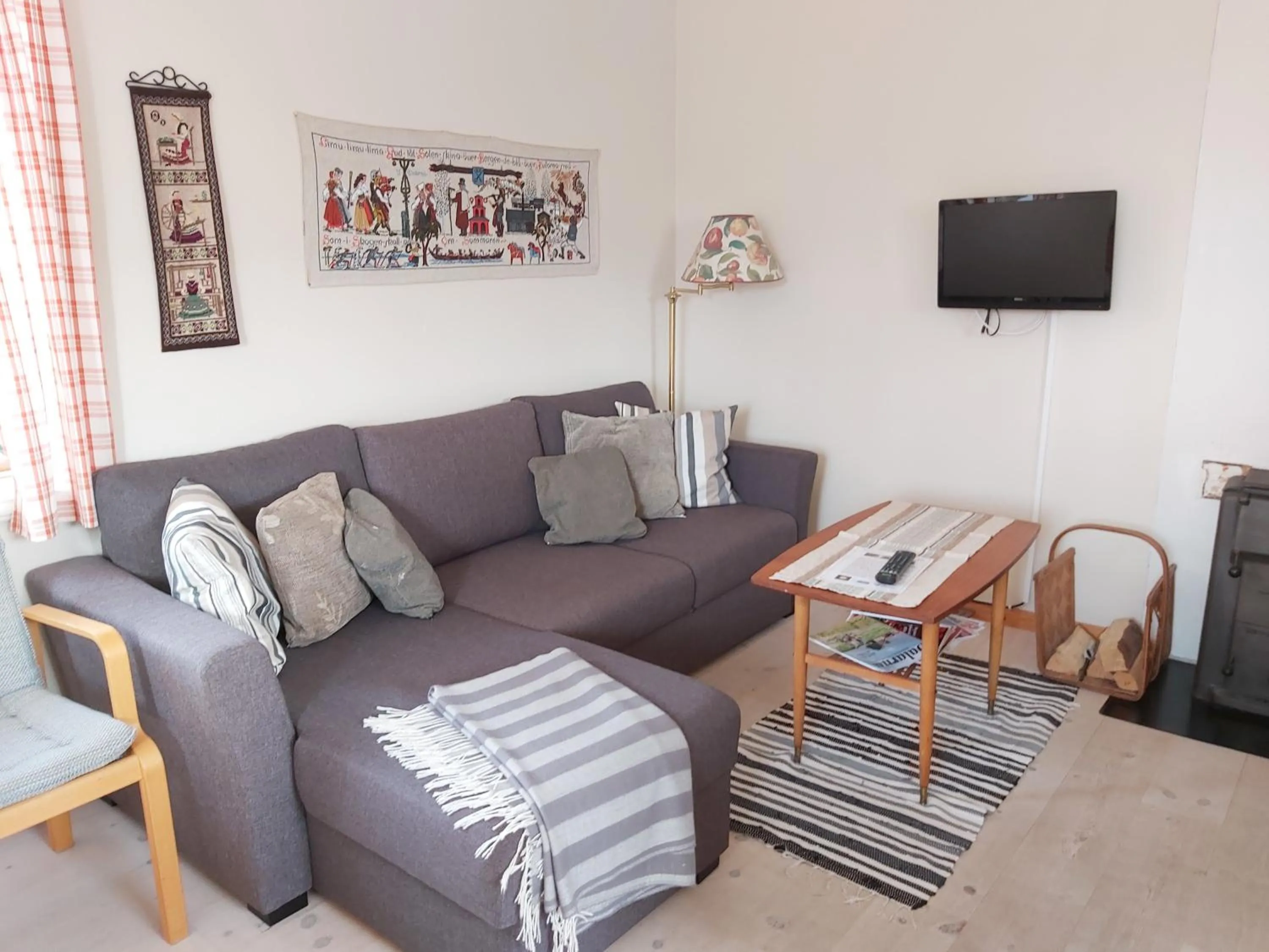 Communal lounge/ TV room in Backlund Boende i Dalarna