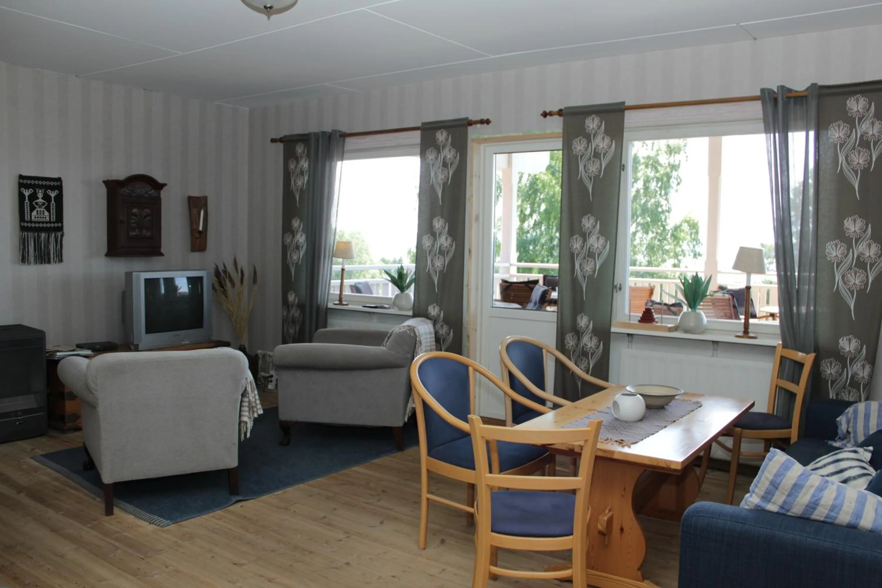 Communal lounge/ TV room in Backlund Boende i Dalarna