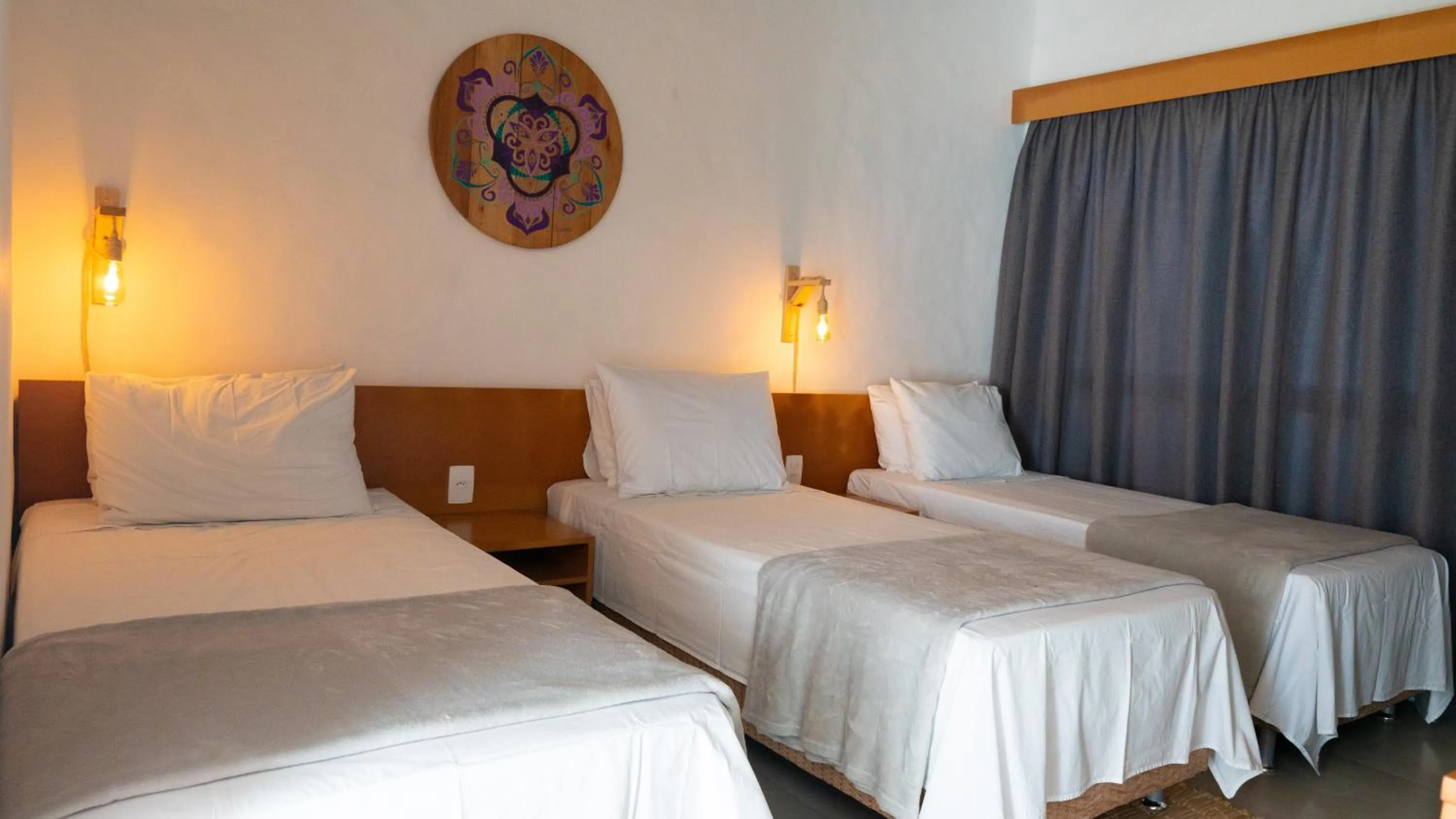 Bed in Pousada Rosa Tropicalia