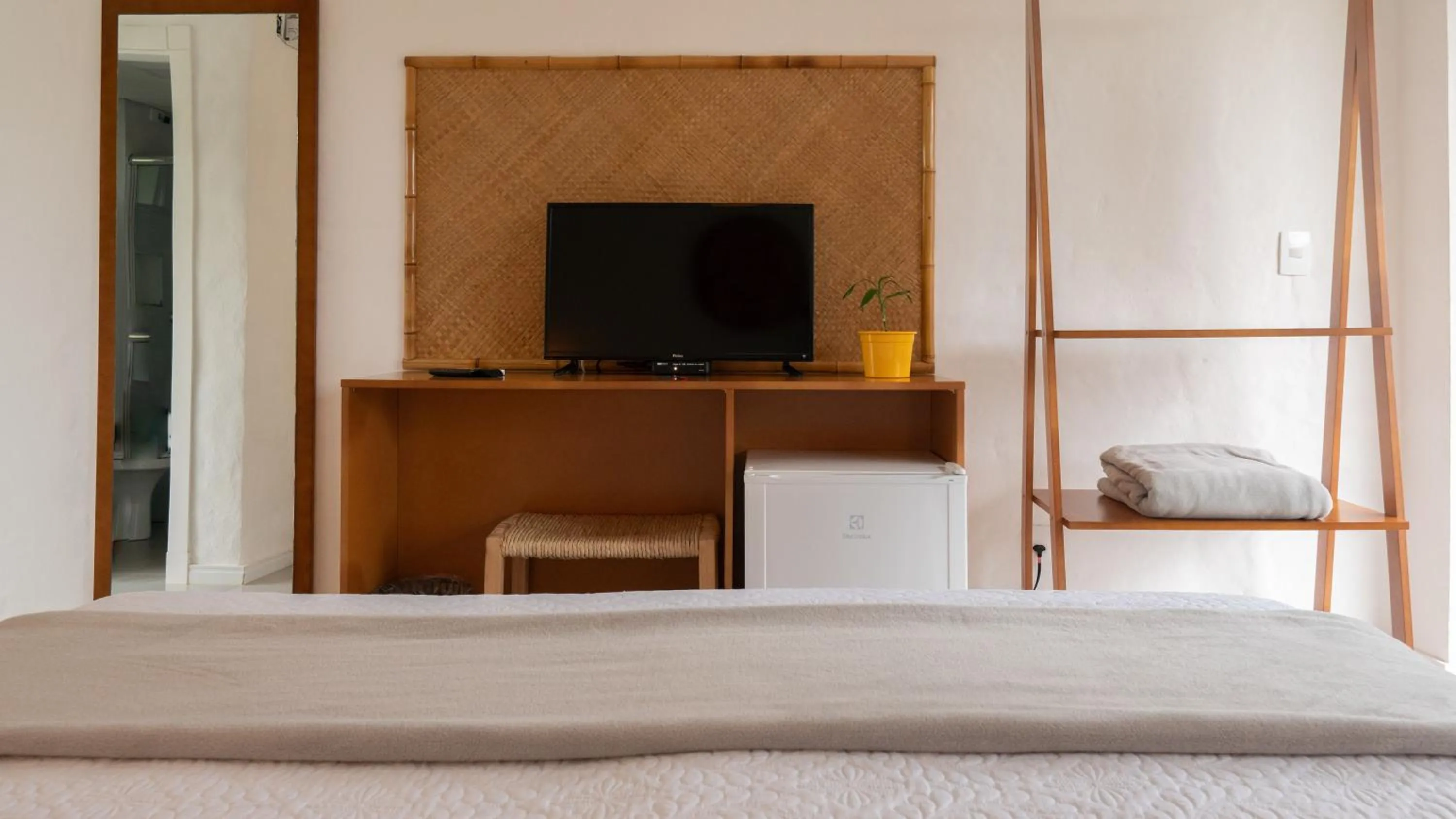 Bed in Pousada Rosa Tropicalia