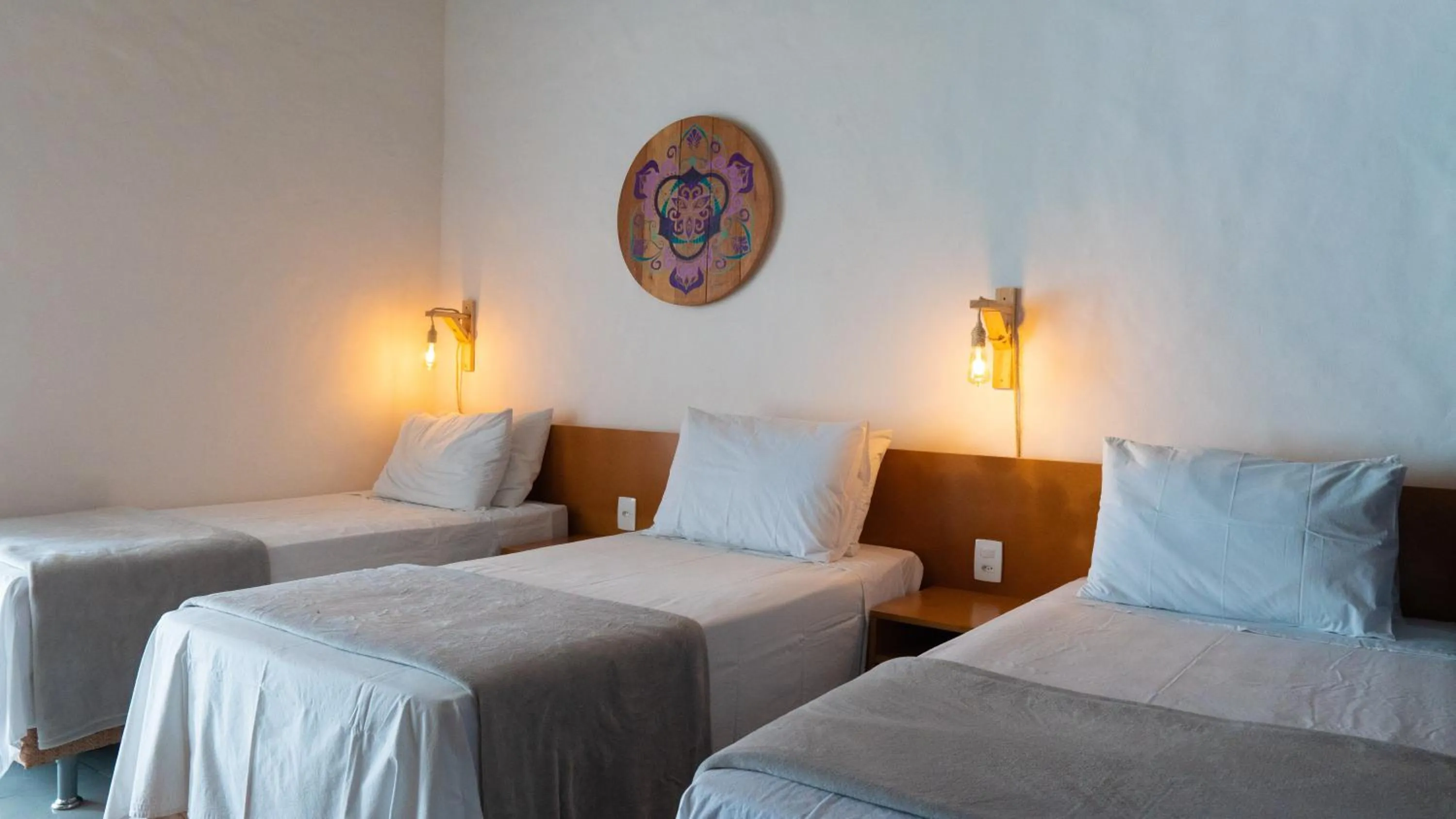 Bed in Pousada Rosa Tropicalia