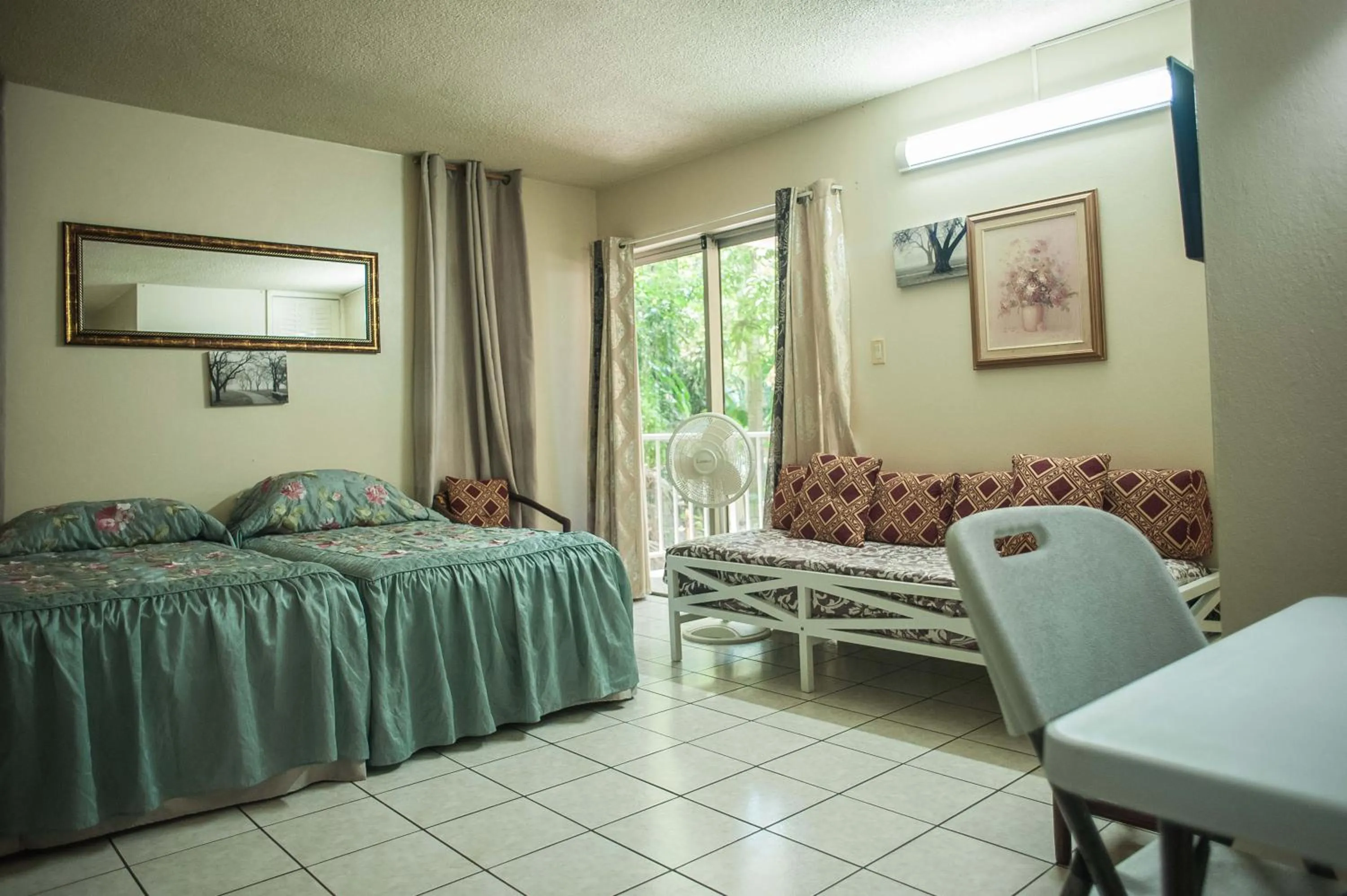 Seating area, Bed in Montego Bay Club Beach Resort