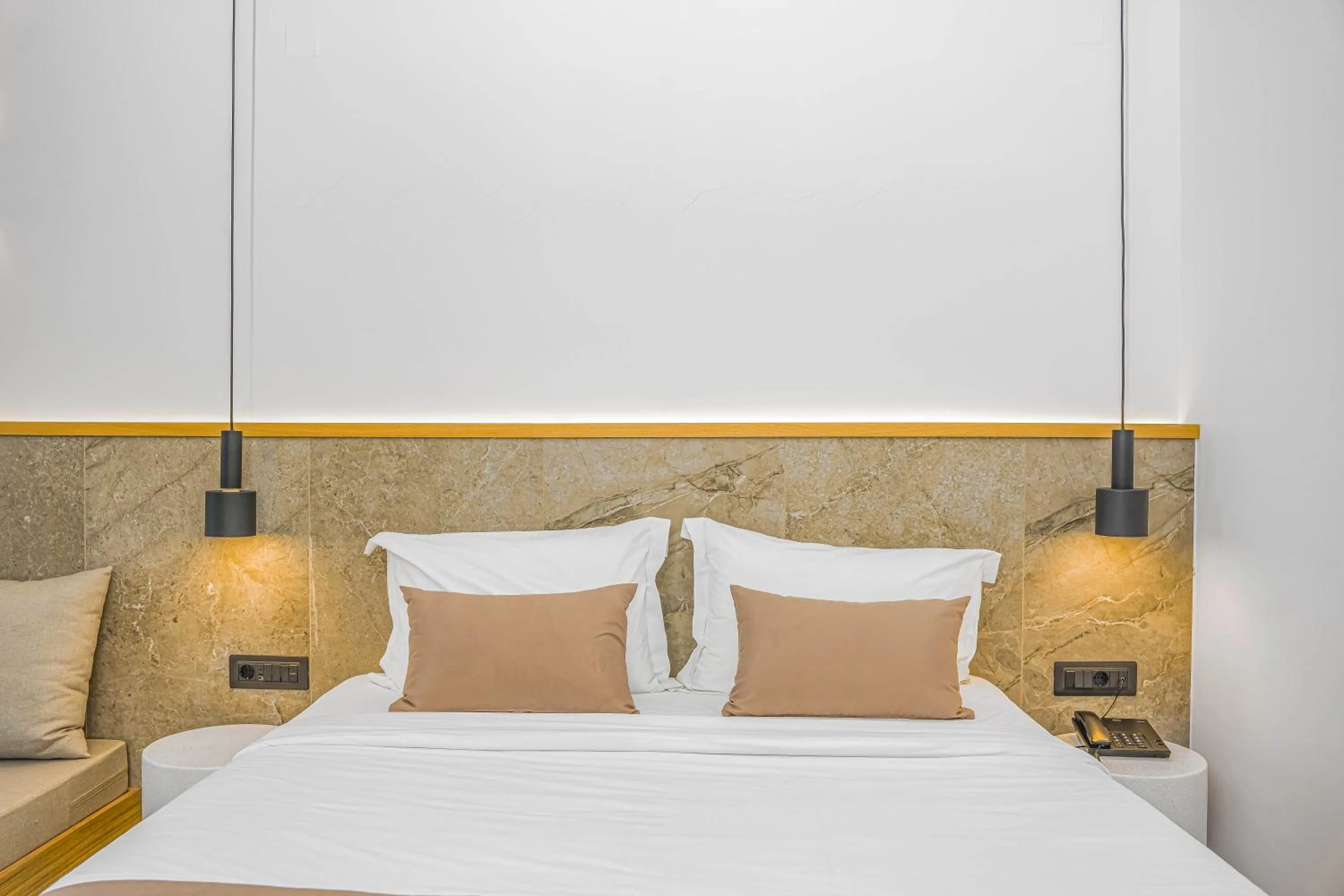 Bed in Panorama Village Hotel