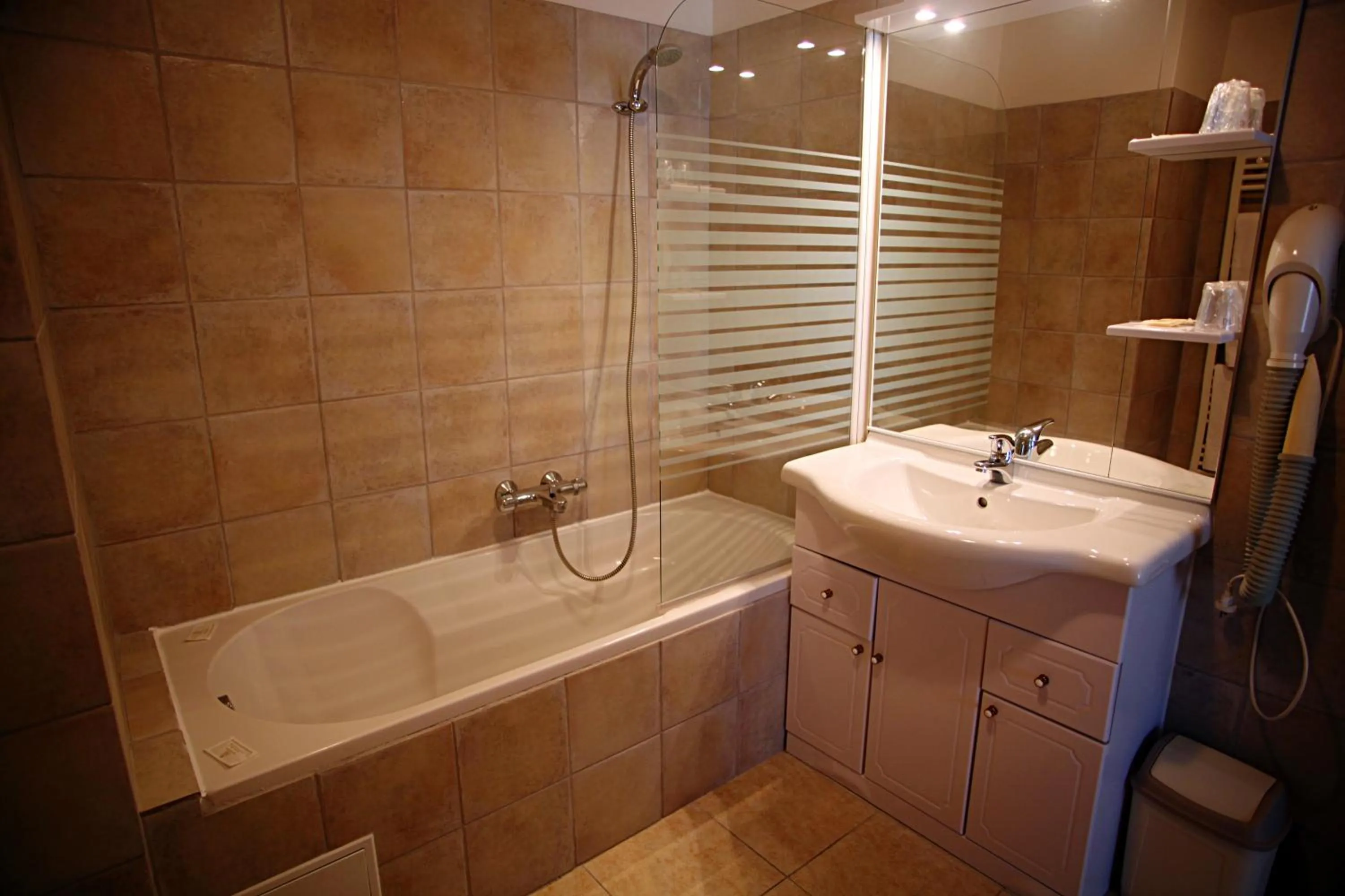 Bathroom in Le Petit Manoir Hotel Provence