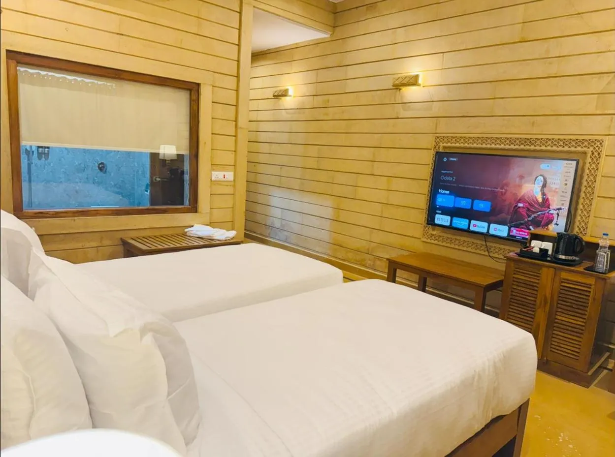 Bed in Hotel Golden Haveli