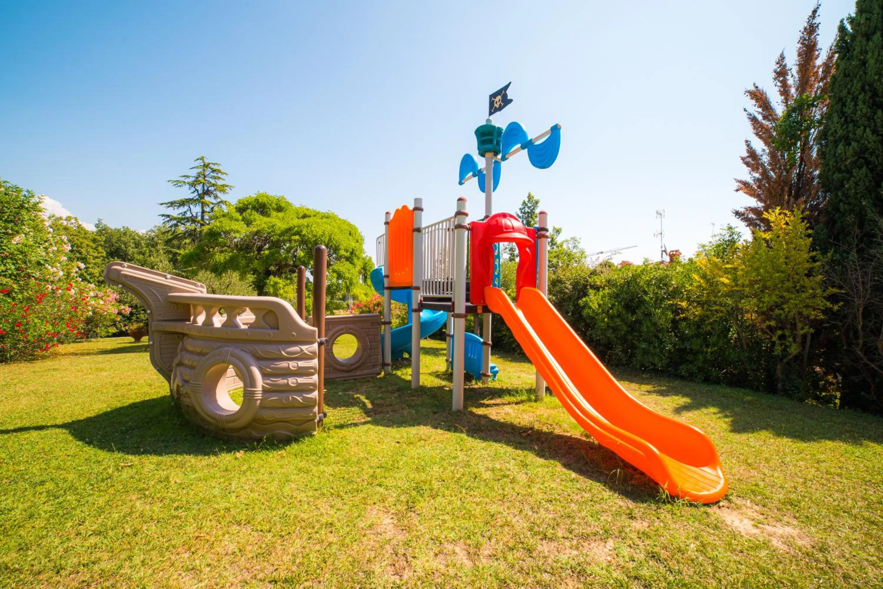Children play ground in Park Residence Il Gabbiano